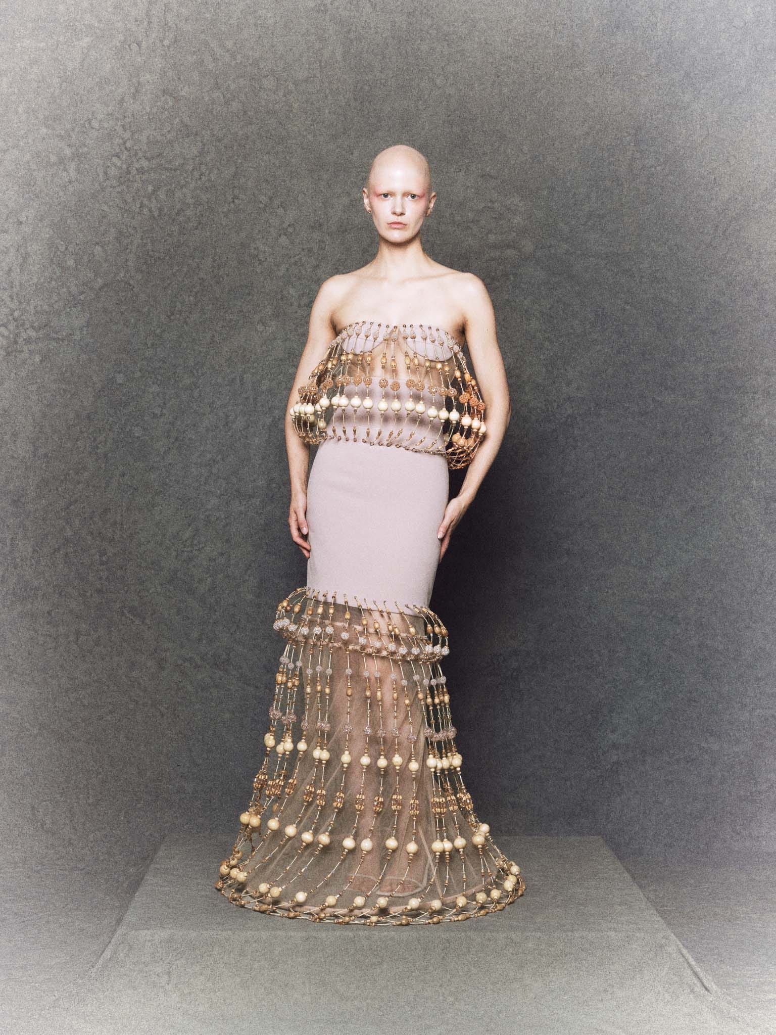 Nude mermaid gown with wooden bead structure, crystal embellishments and sculpting