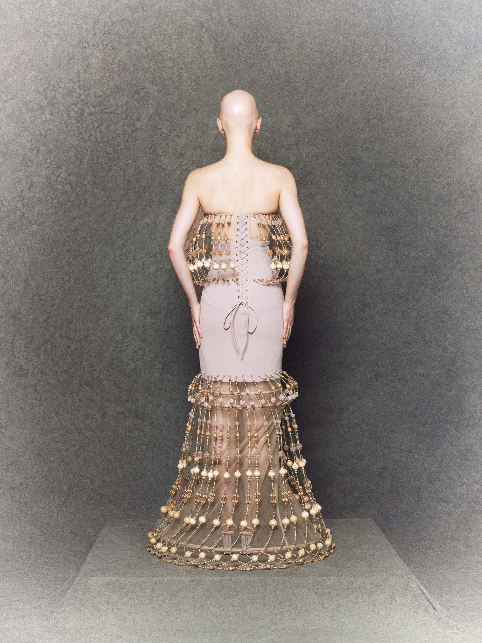 Nude mermaid gown with wooden bead structure, crystal embellishments and sculpting - Image 2