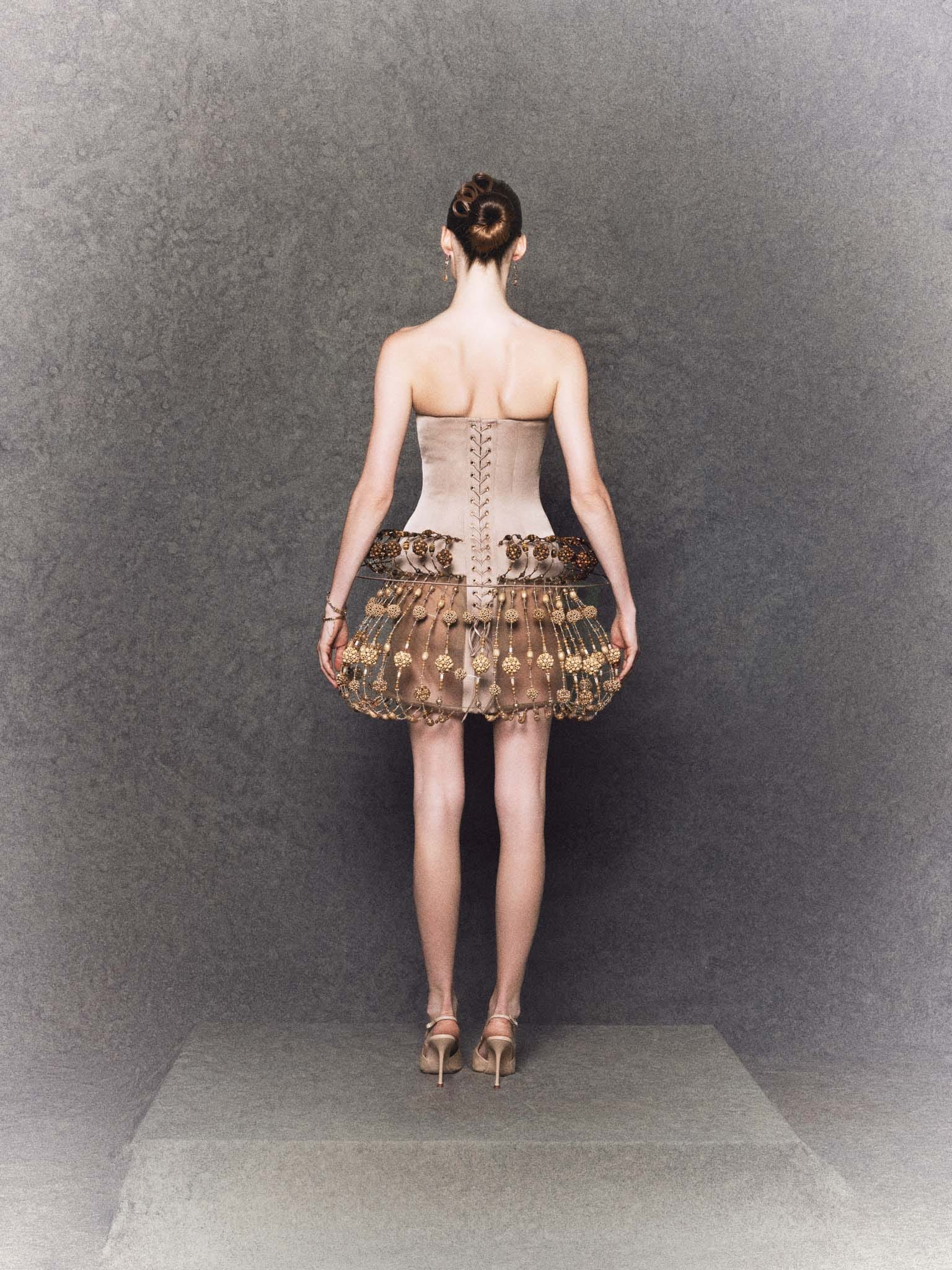 Brown silk sculptural mini dress with wooden beads, crystal accents and structure - Image 2