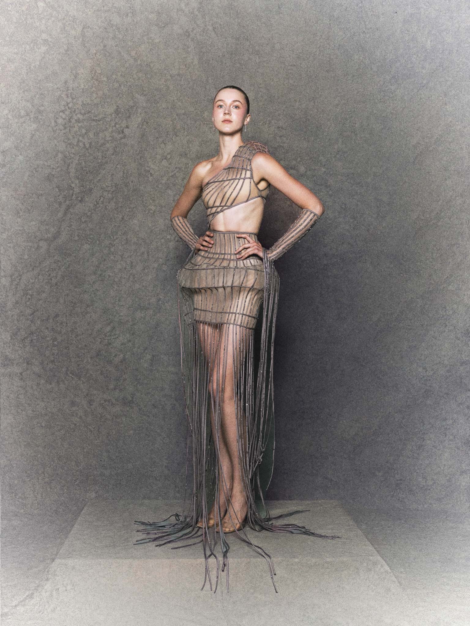 One-Shoulder Nude Mesh Mini Dress with Brown Trim and Cascading Crystal Fringes