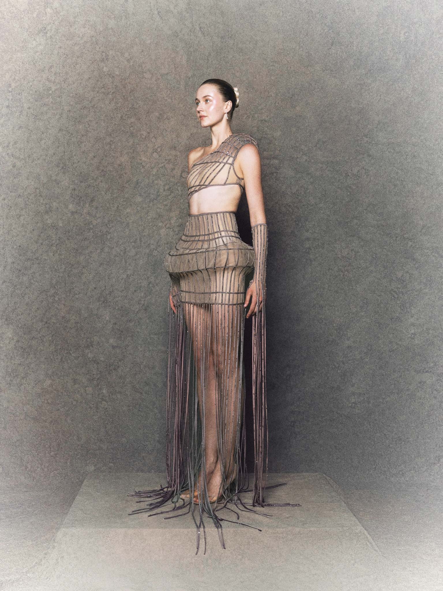 One-Shoulder Nude Mesh Mini Dress with Brown Trim and Cascading Crystal Fringes - Image 3