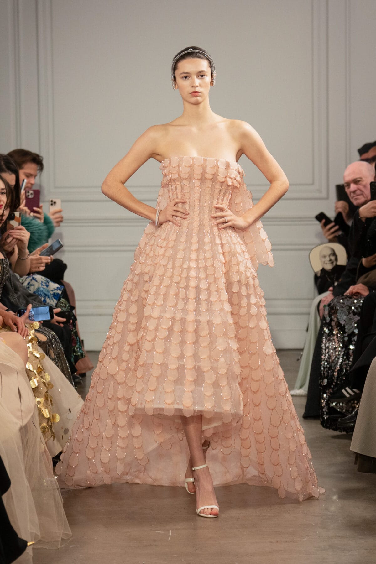 Strapless blush pink ball gown with sculptural train