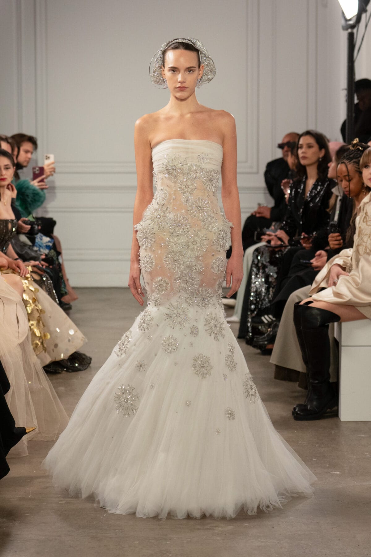 White strapless trumpet tulle gown with 3D crystal dandelion appliqués