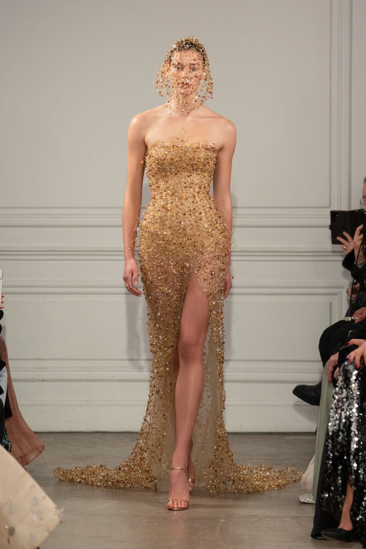 Strapless slit mermaid gown in metallic gold