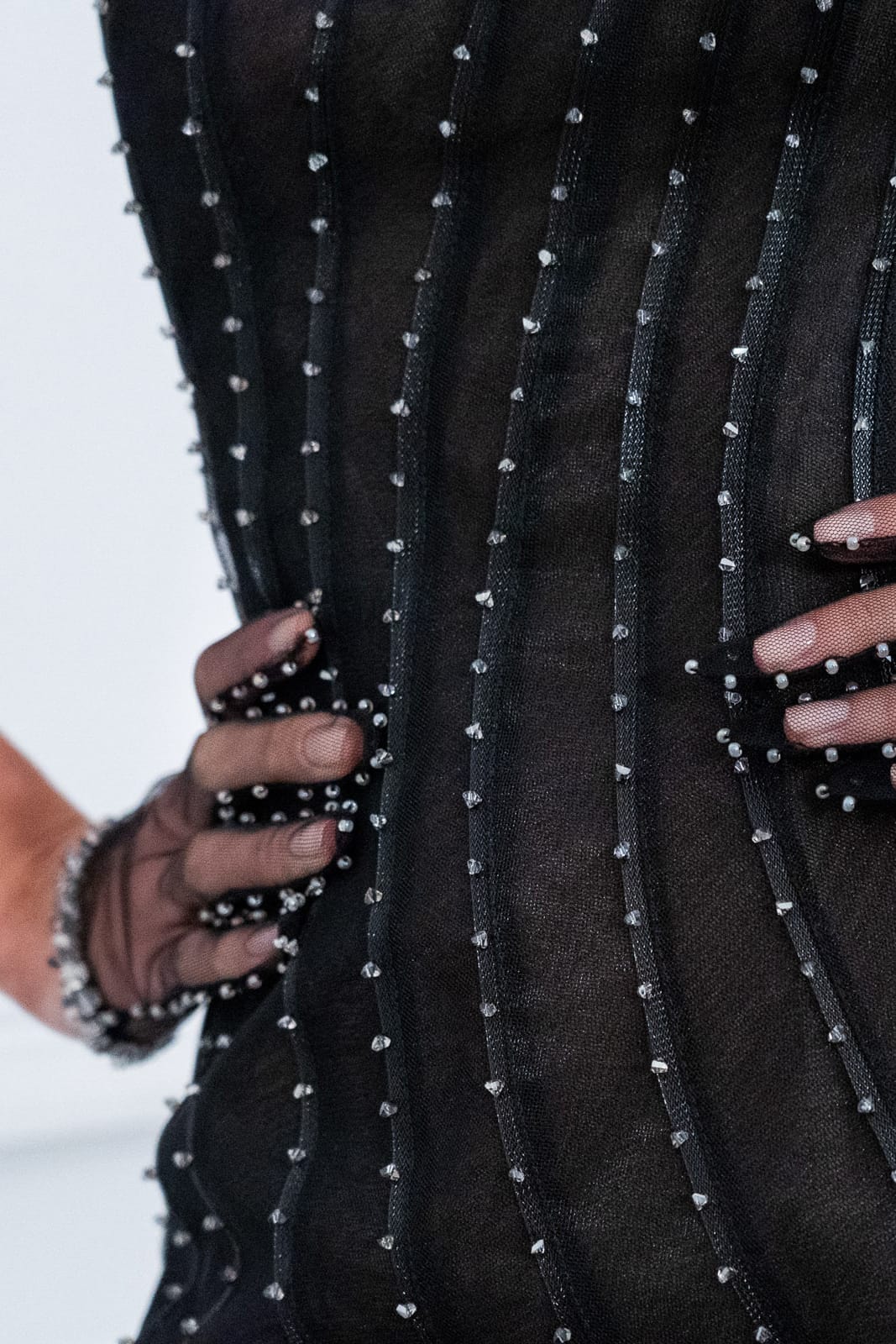 Asymmetrical black trumpet dress with beaded mesh