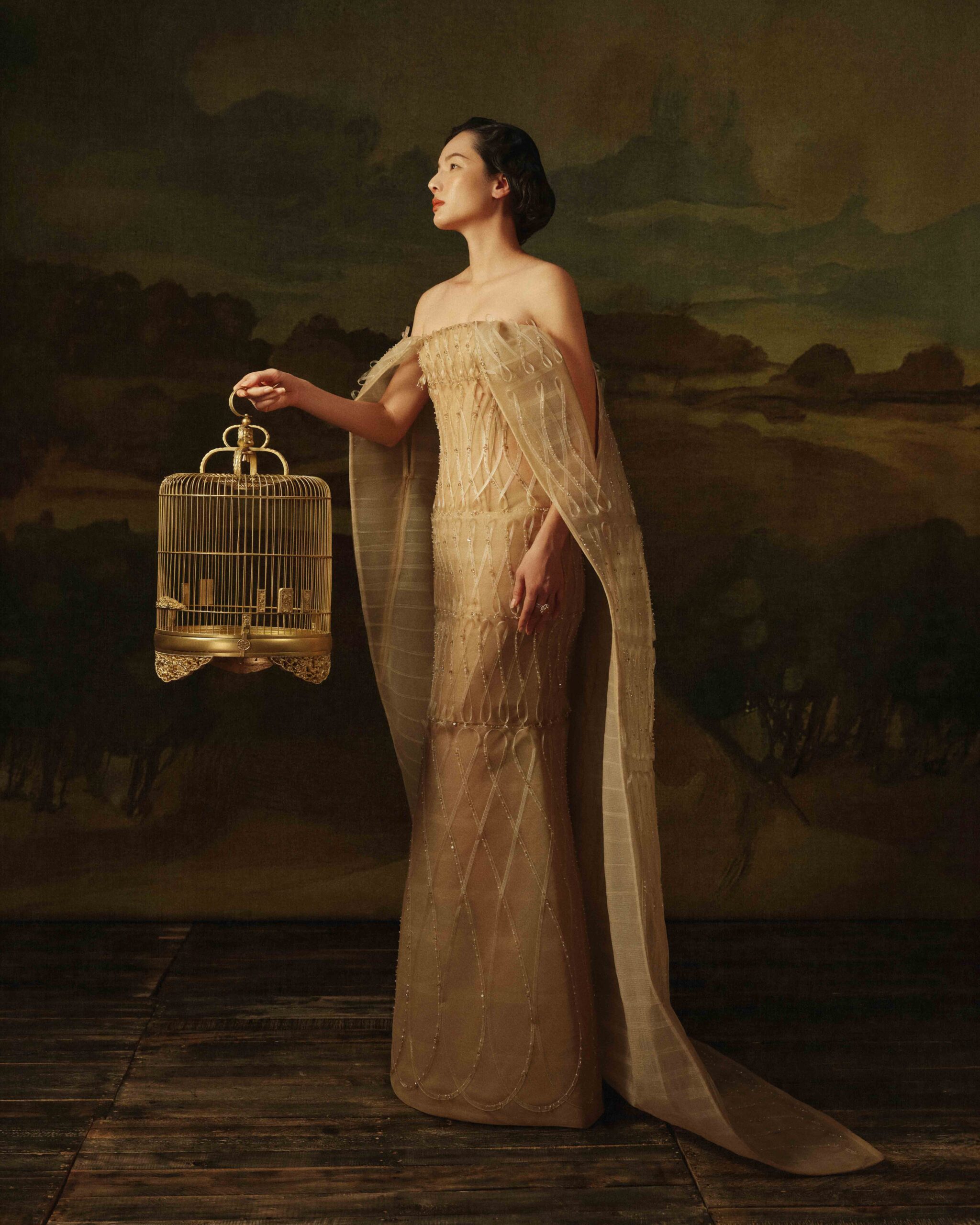 Floor-length column gown in light beige