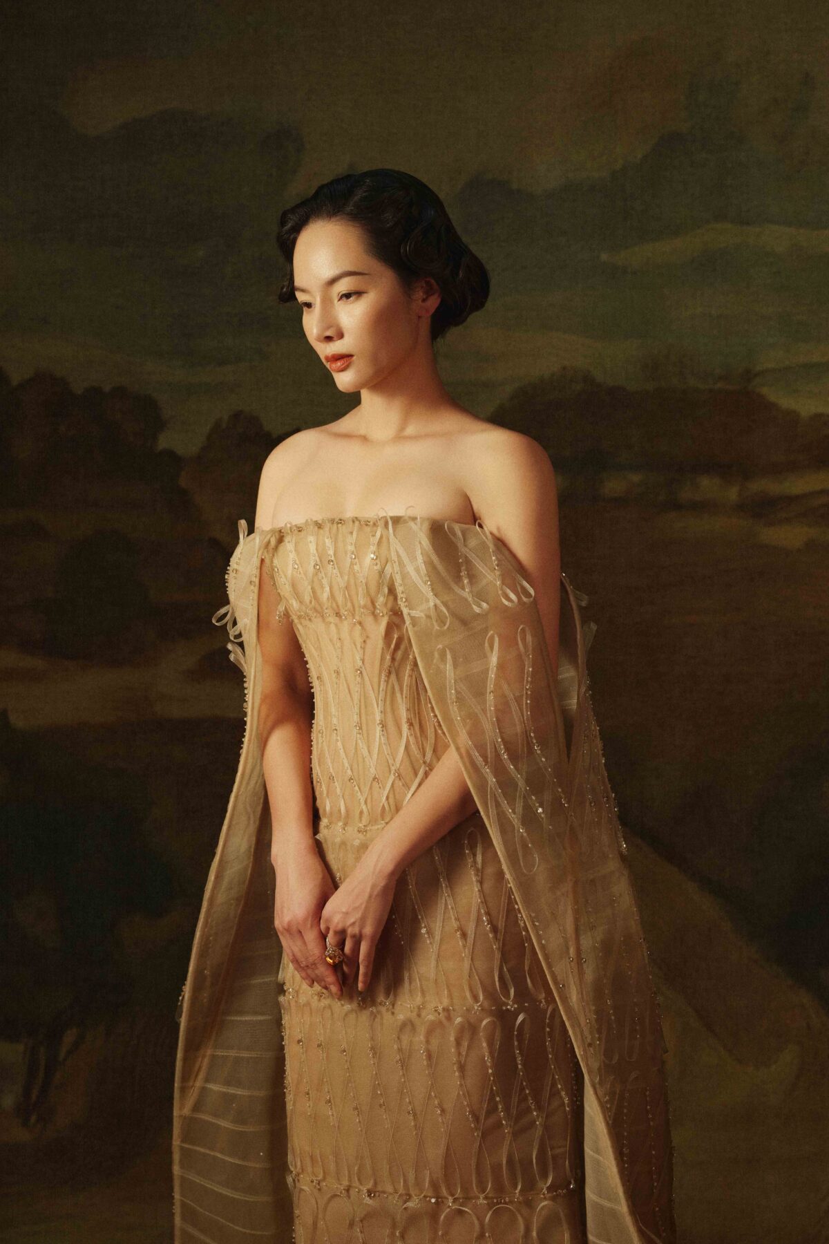Floor-length column gown in light beige