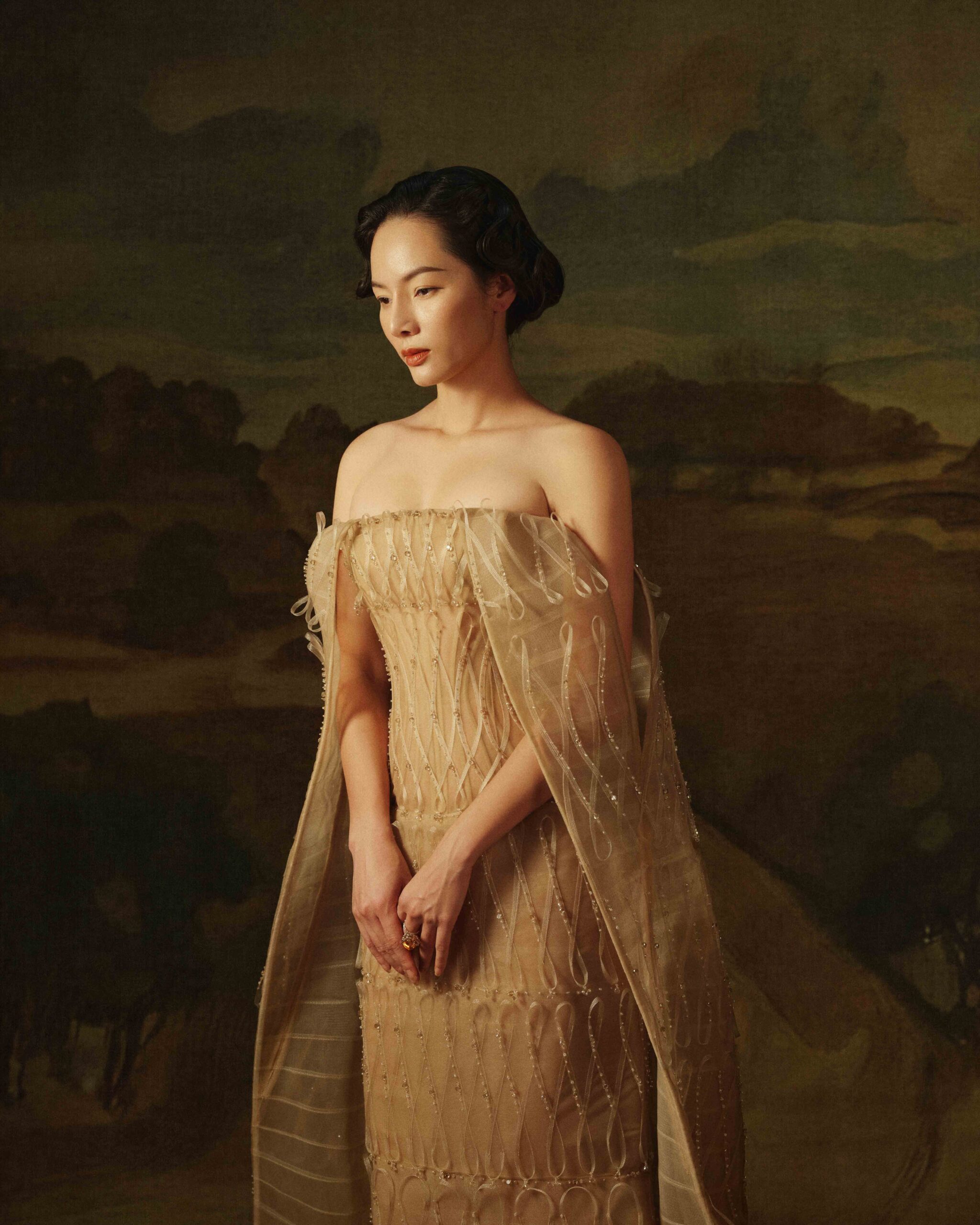 Floor-length column gown in light beige