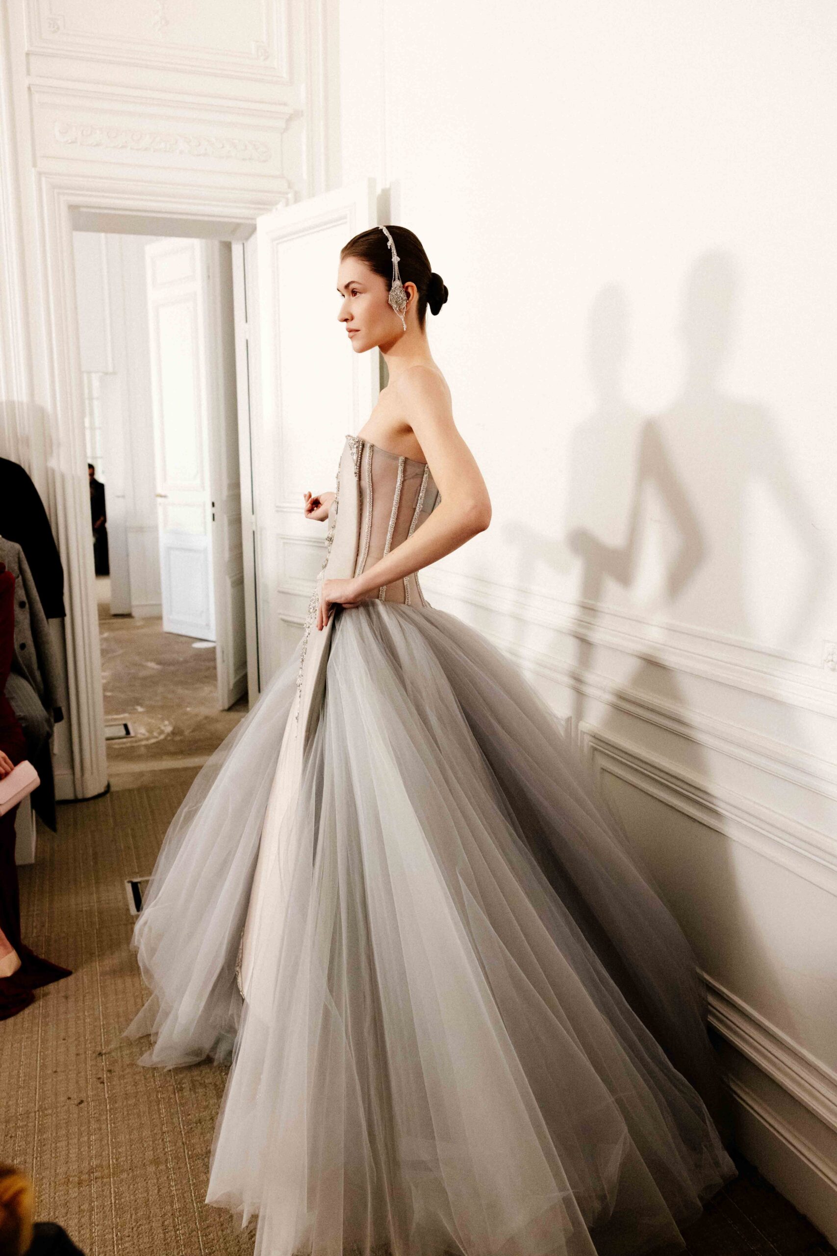 Strapless dove grey tulle ball gown with Áo Dài-inspired satin panel