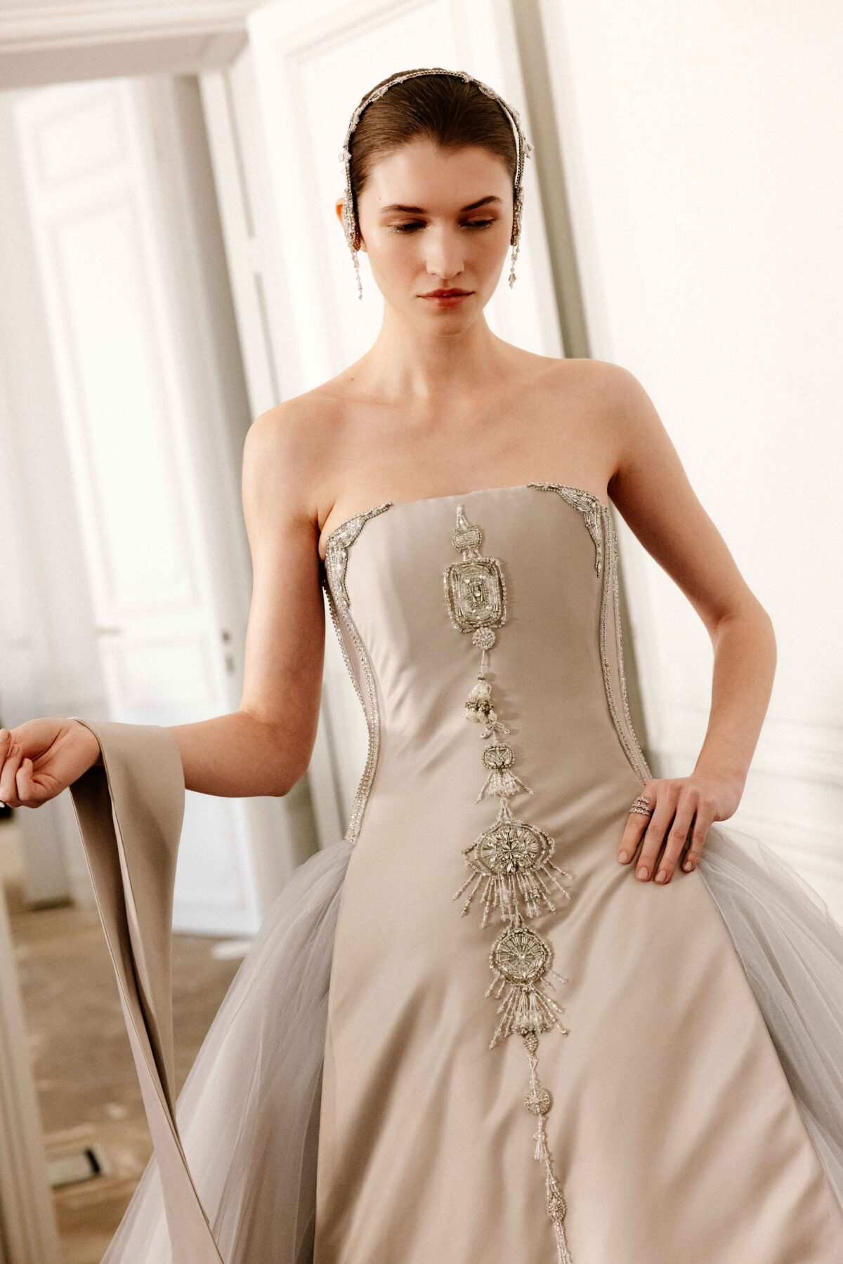 Strapless dove grey tulle ball gown with Áo Dài-inspired satin panel