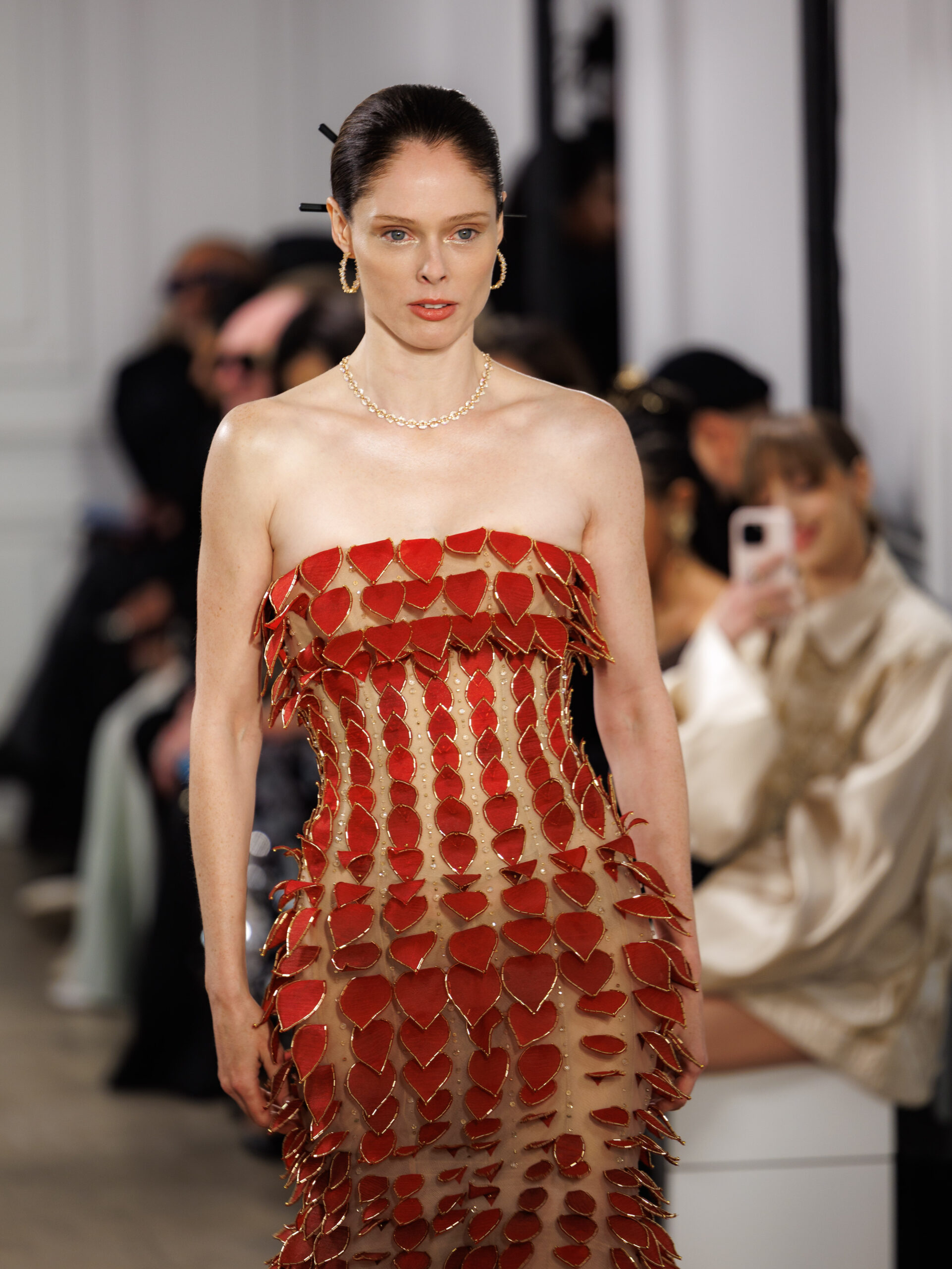 Strapless floor-length trumpet gown with crimson chiffon leaves
