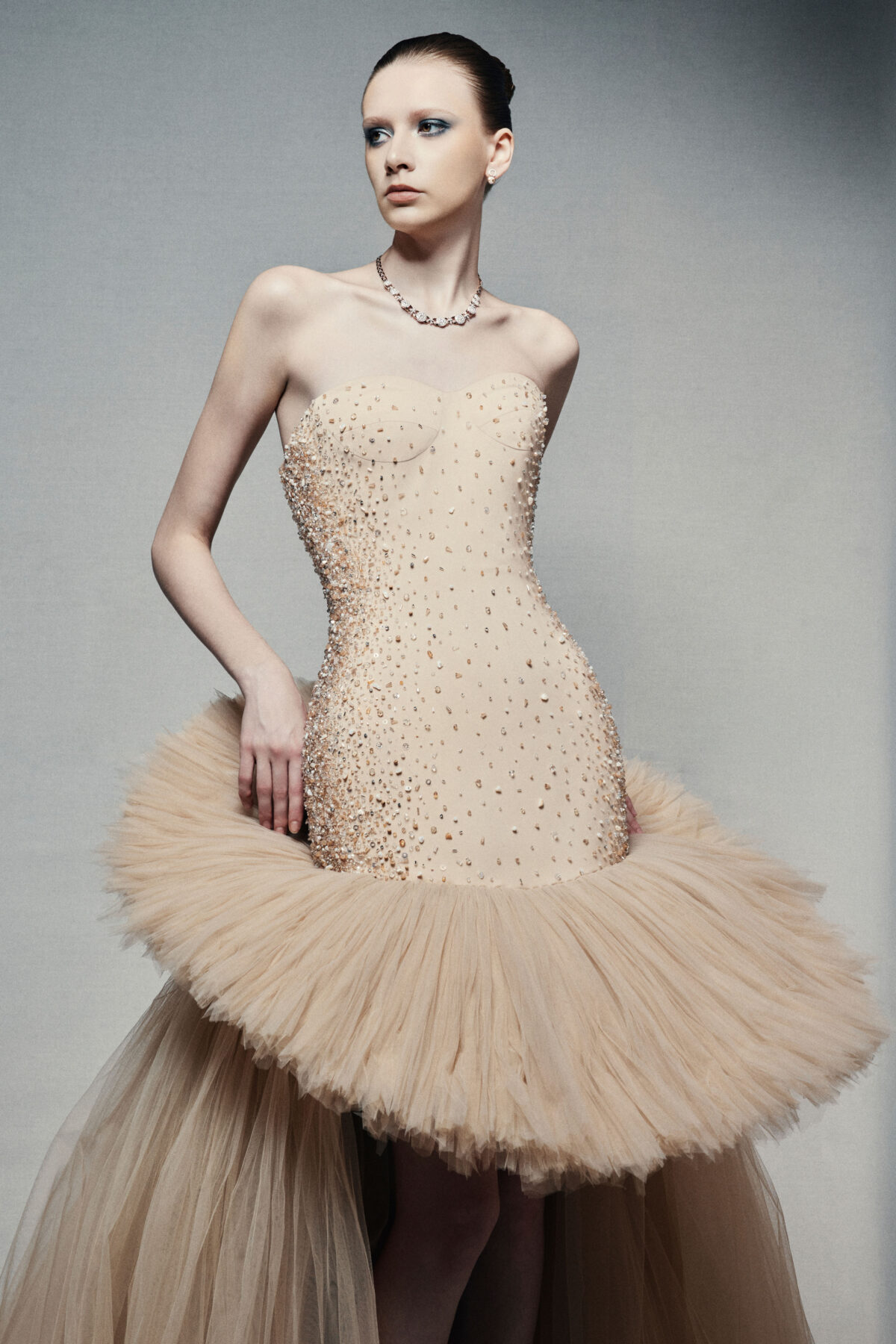 Strapless high-low ball gown in champagne