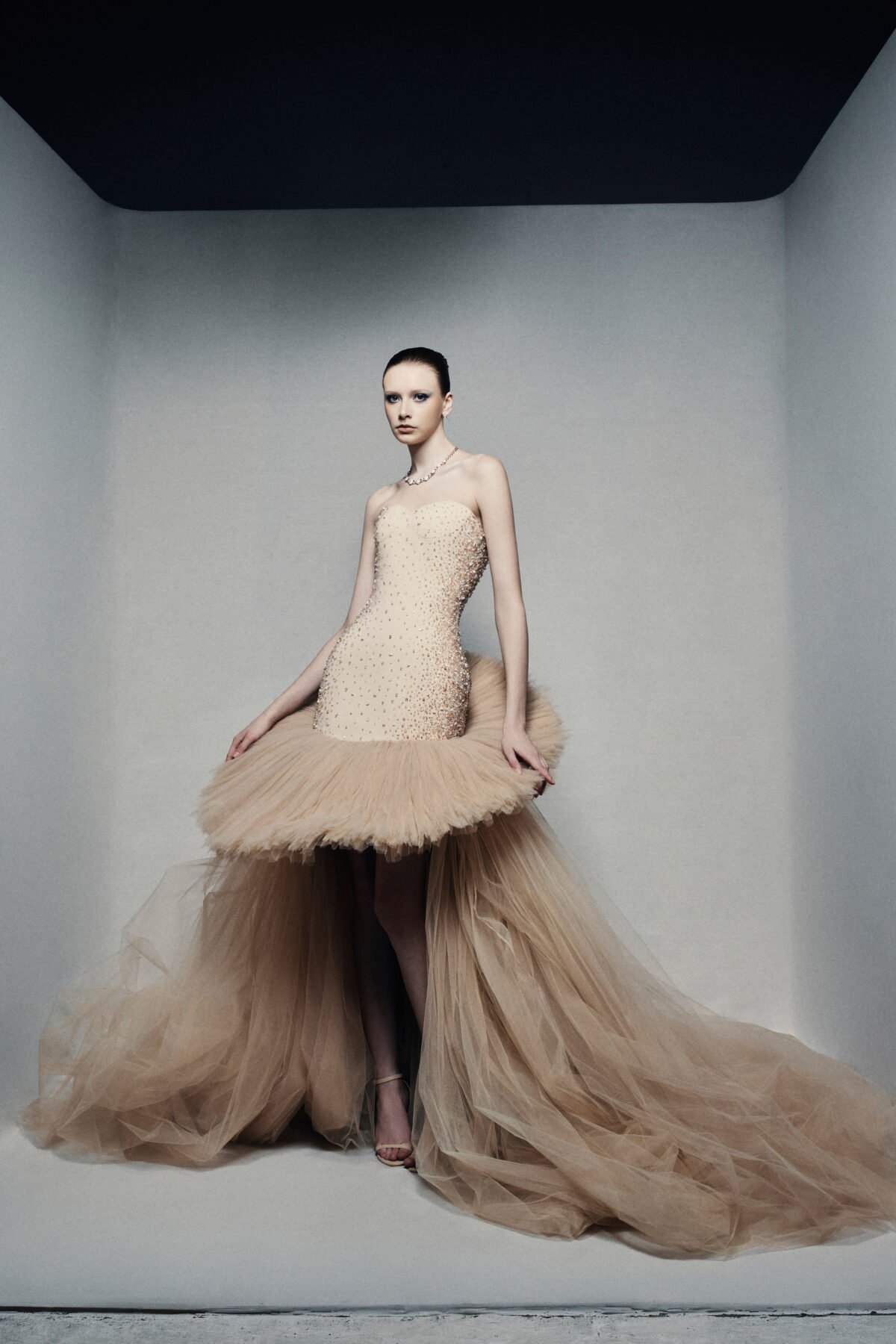 Strapless high-low ball gown in champagne
