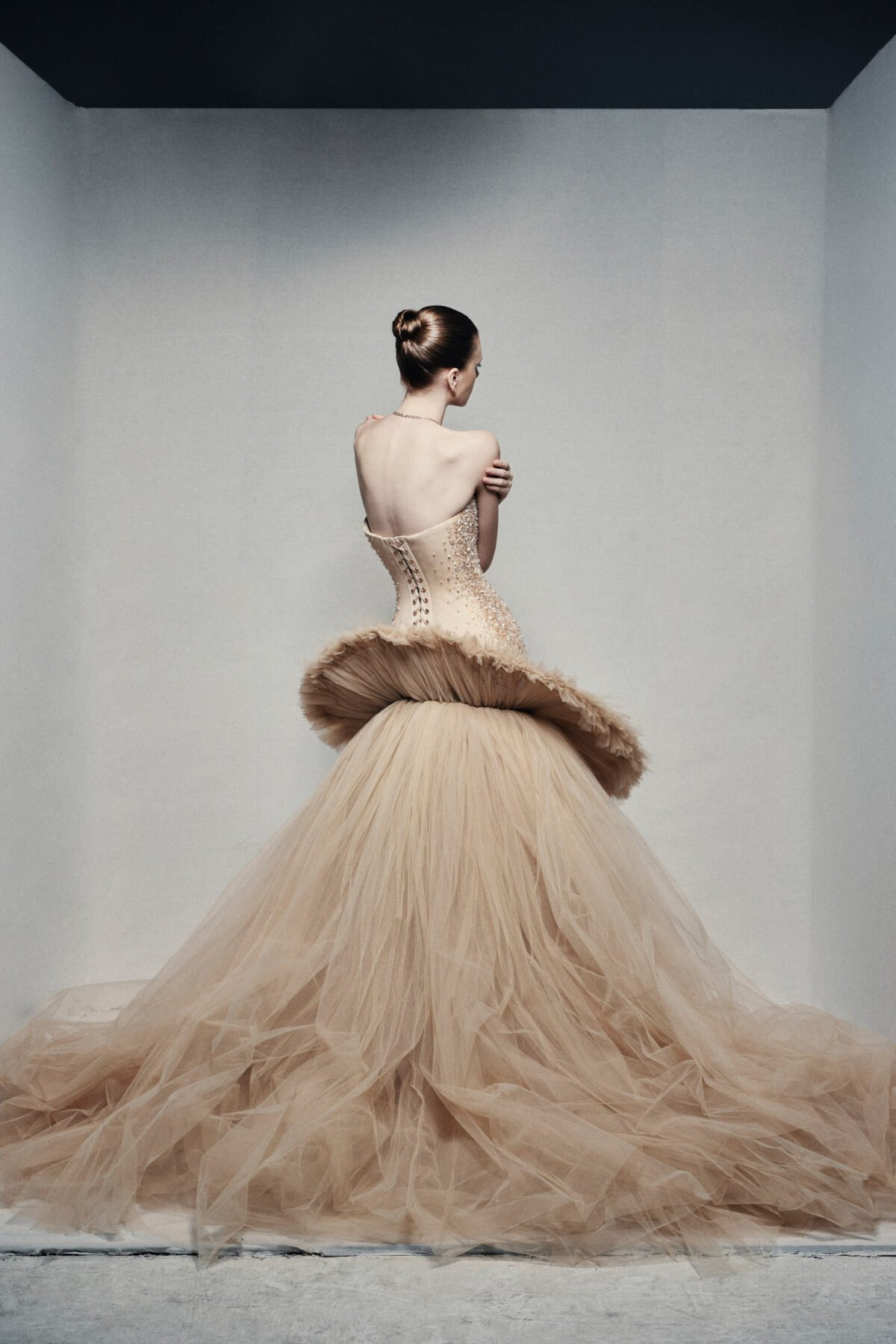Strapless high-low ball gown in champagne