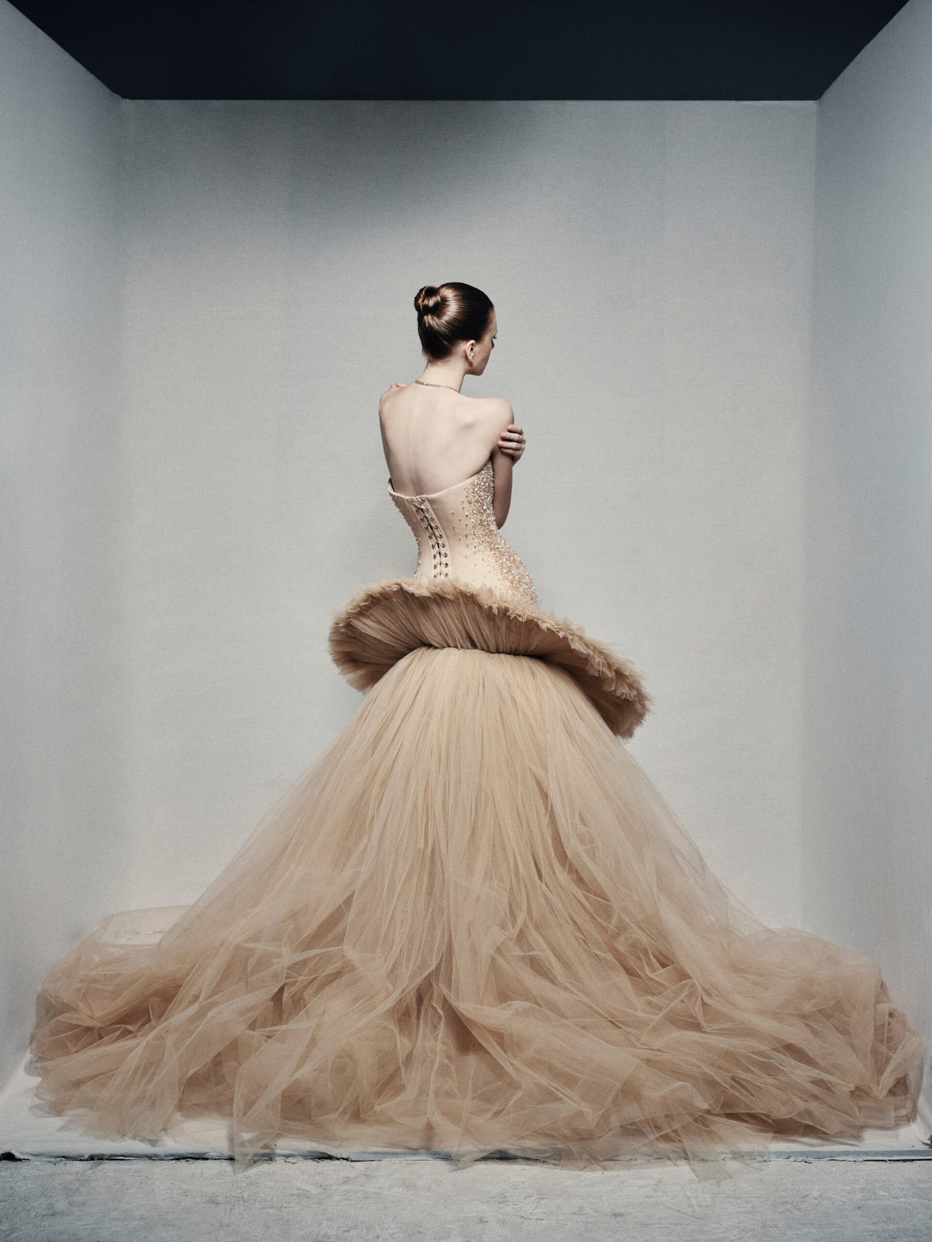 Strapless high-low ball gown in champagne