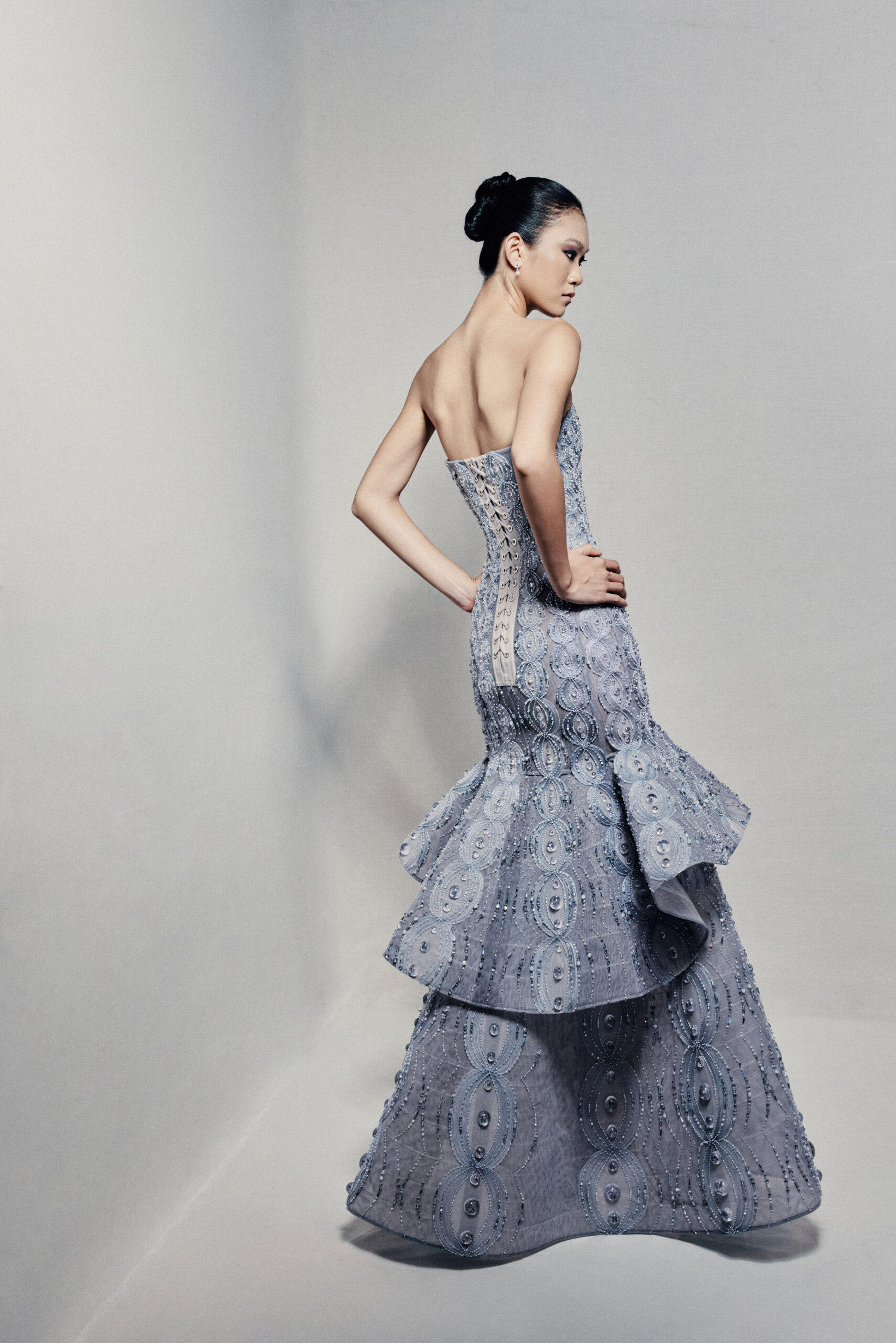 Strapless peplum mermaid gown in powder blue