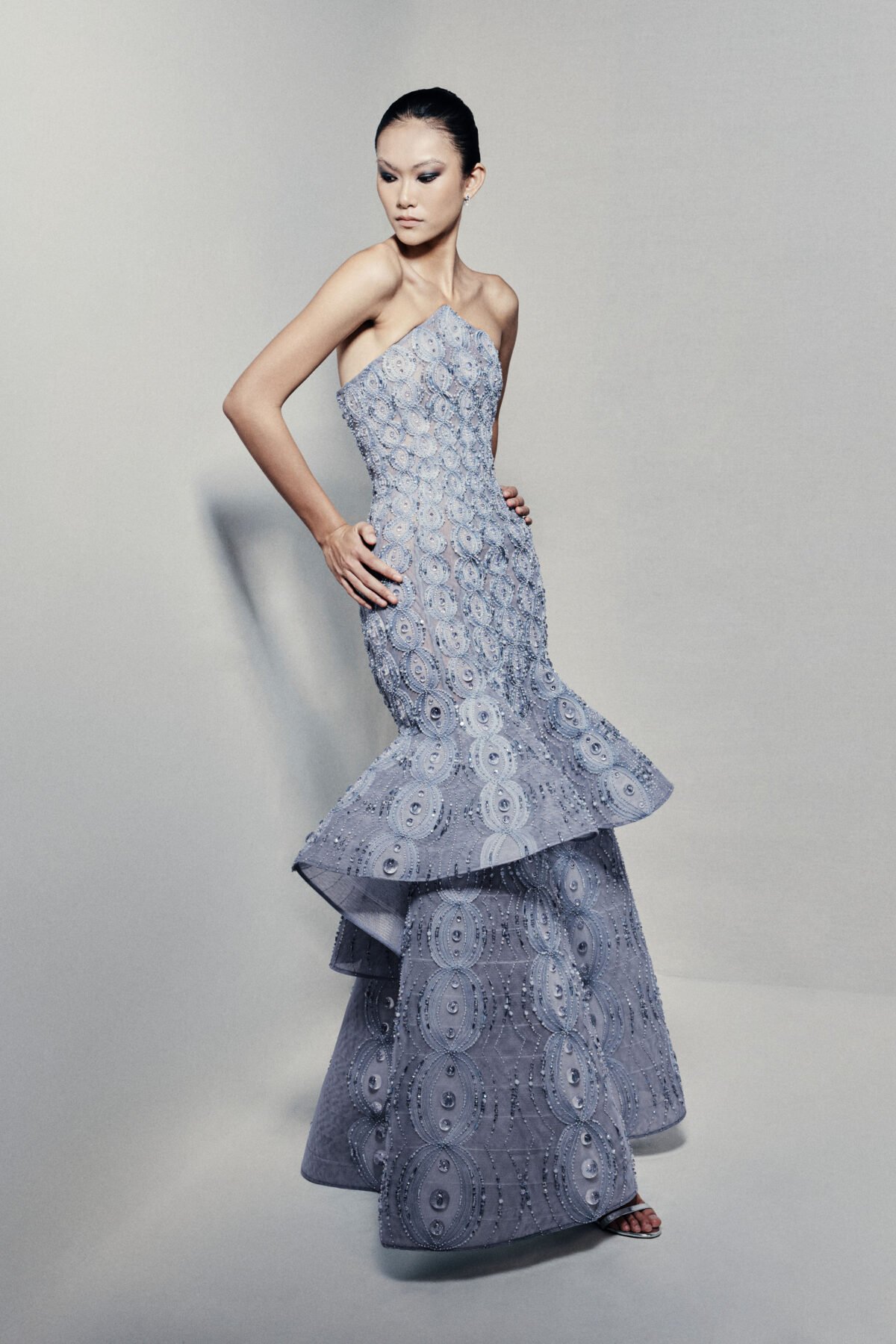 Strapless peplum mermaid gown in powder blue