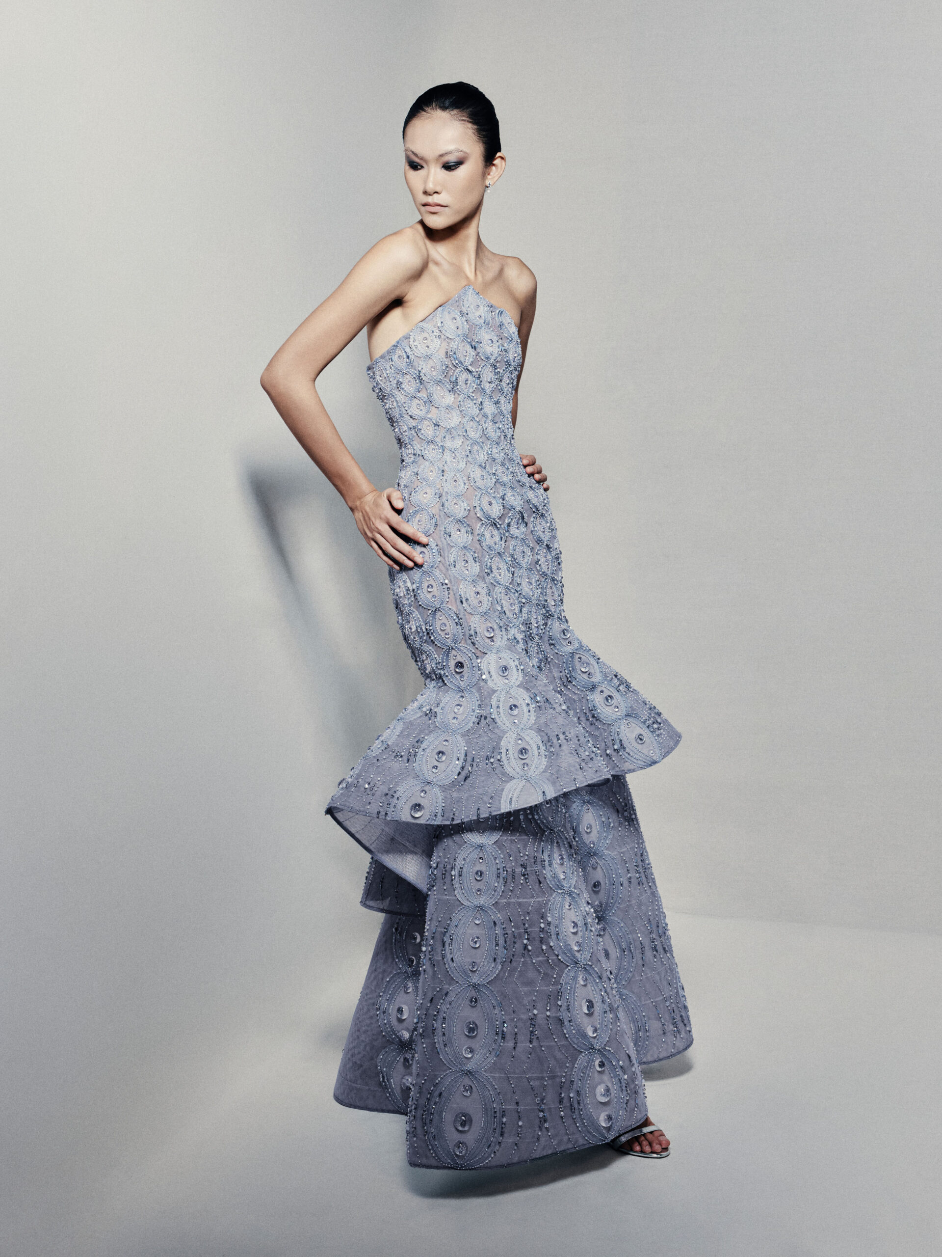 Strapless peplum mermaid gown in powder blue