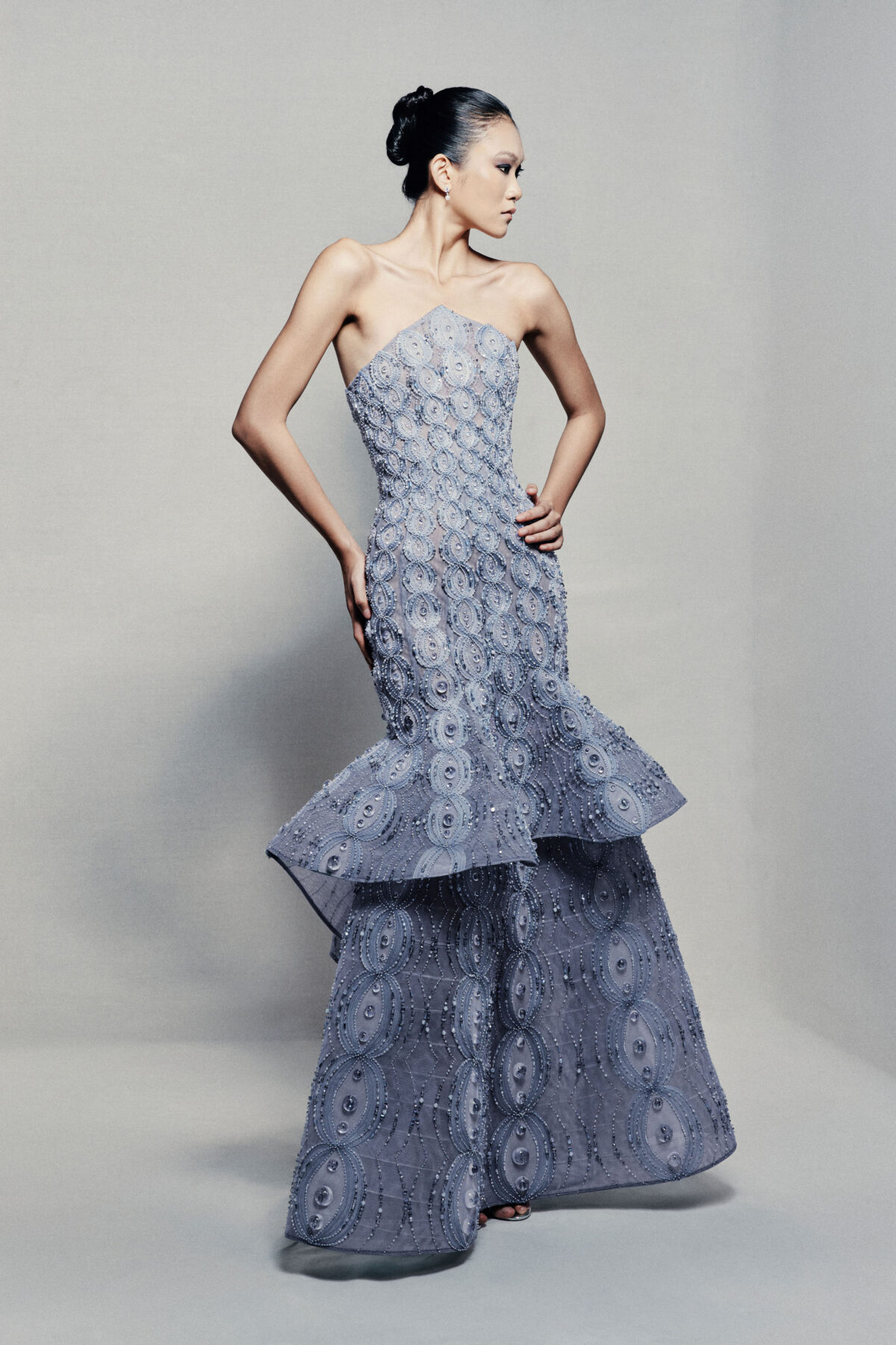 Strapless peplum mermaid gown in powder blue
