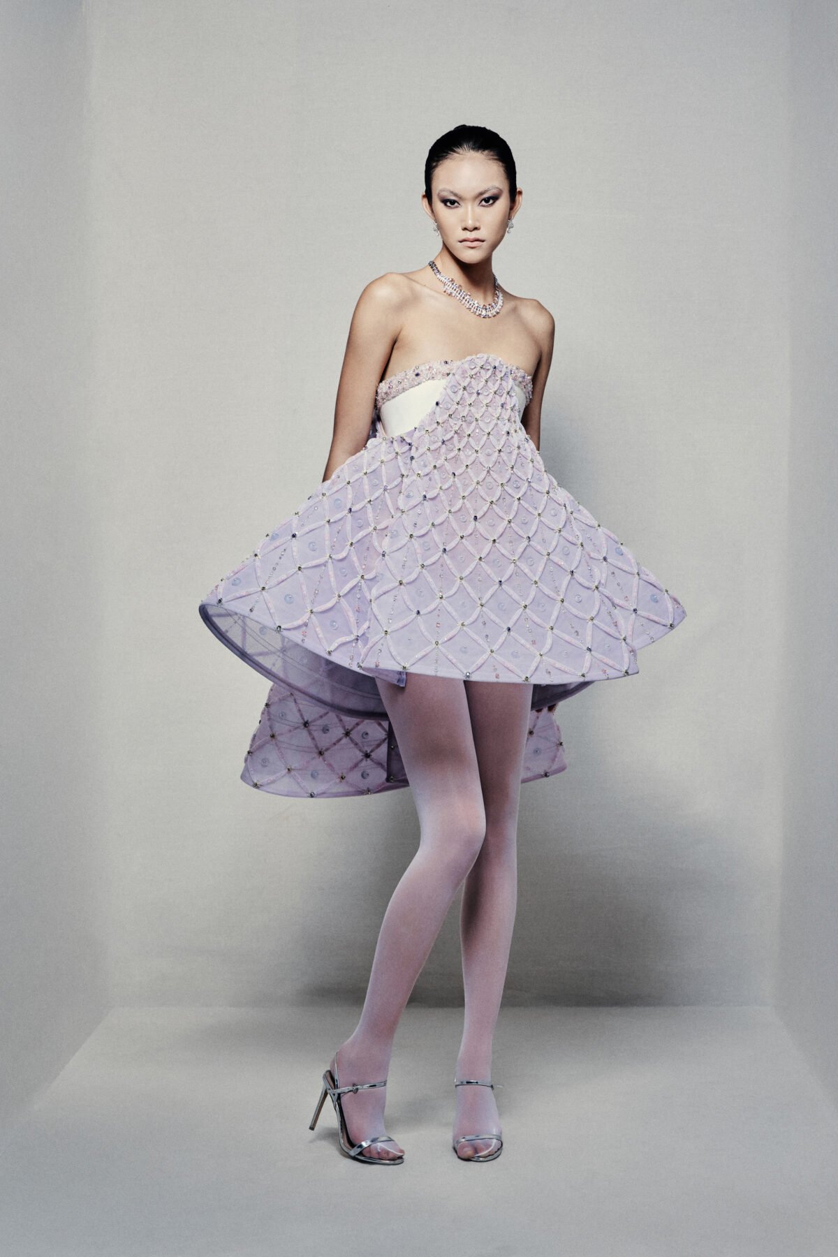 Strapless A-line babydoll dress with lavender high-low skirt