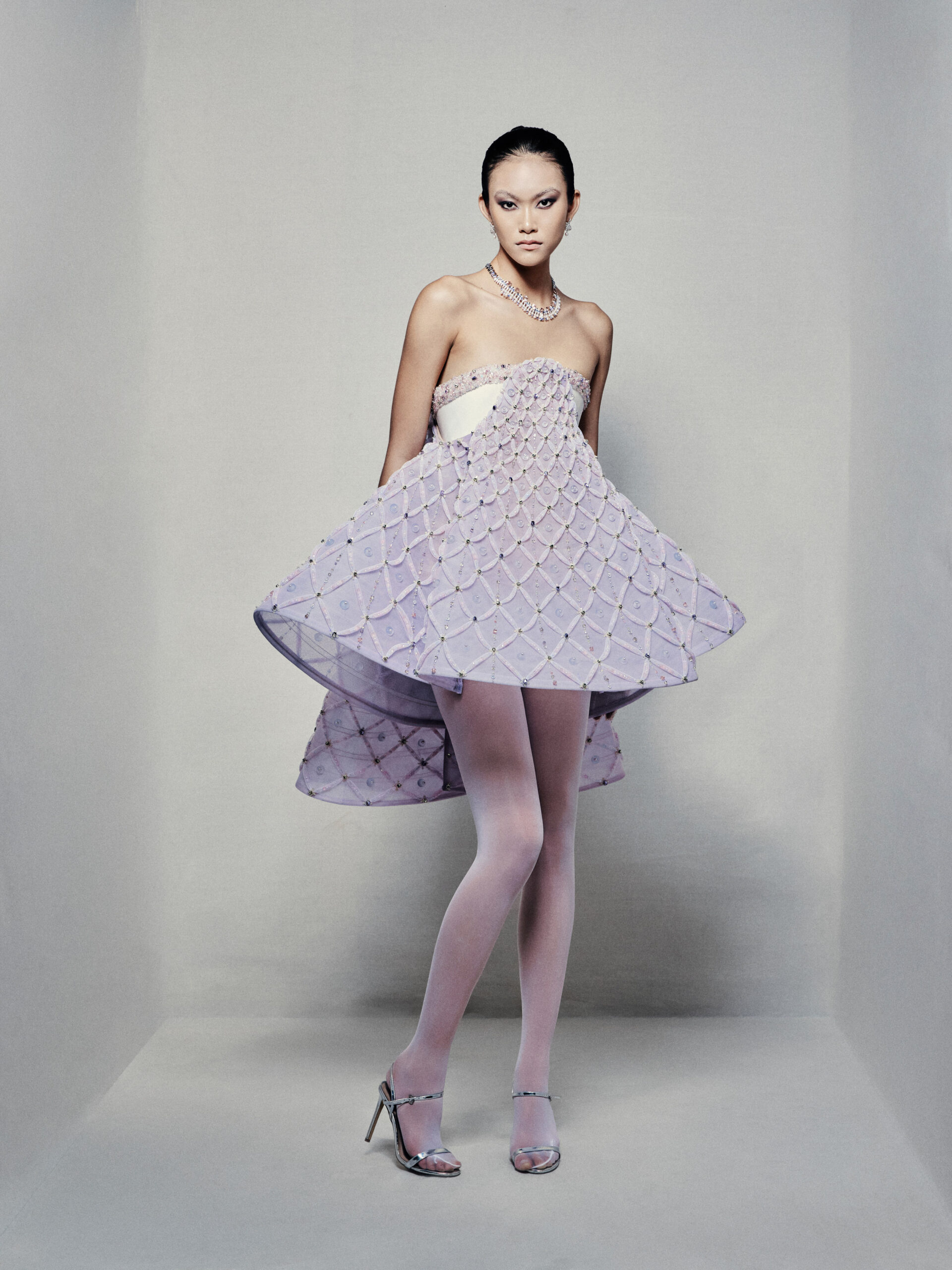 Strapless A-line babydoll dress with lavender high-low skirt