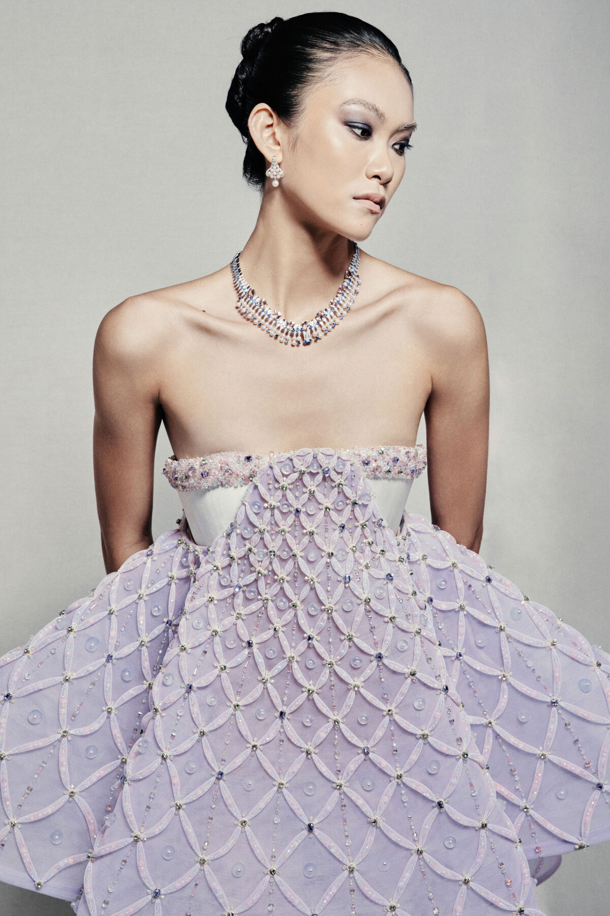 Strapless A-line babydoll dress with lavender high-low skirt