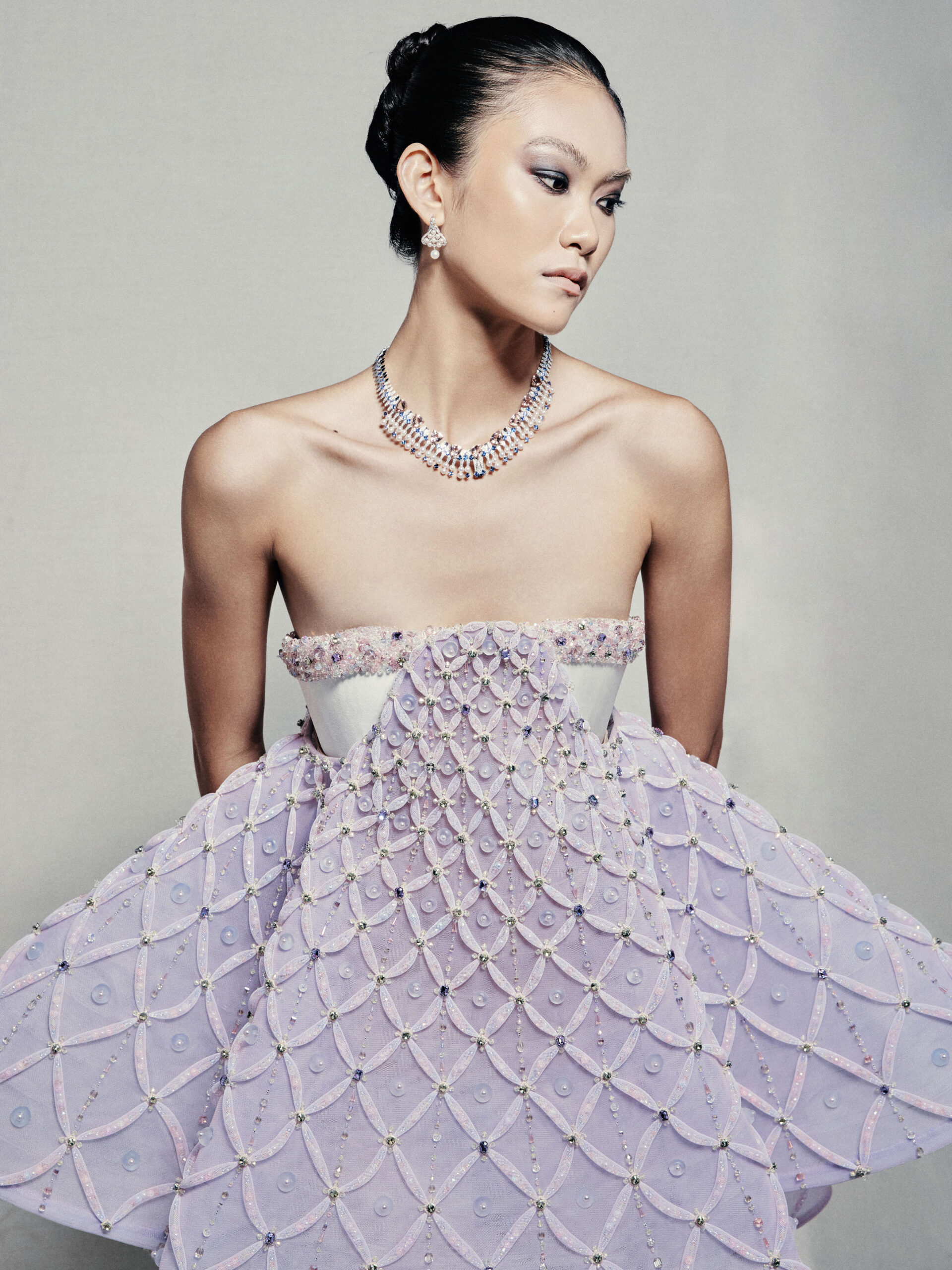 Strapless A-line babydoll dress with lavender high-low skirt