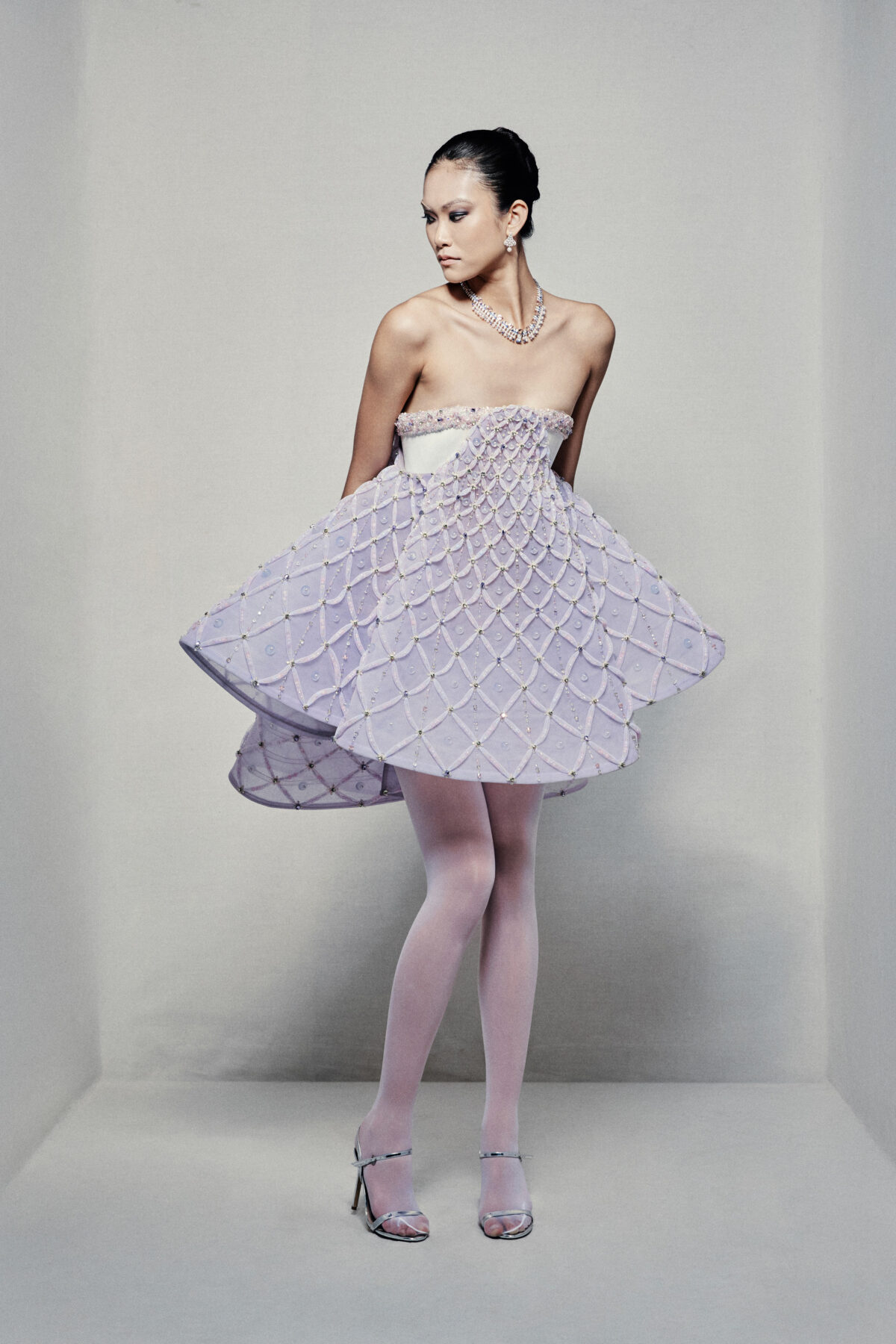 Strapless A-line babydoll dress with lavender high-low skirt