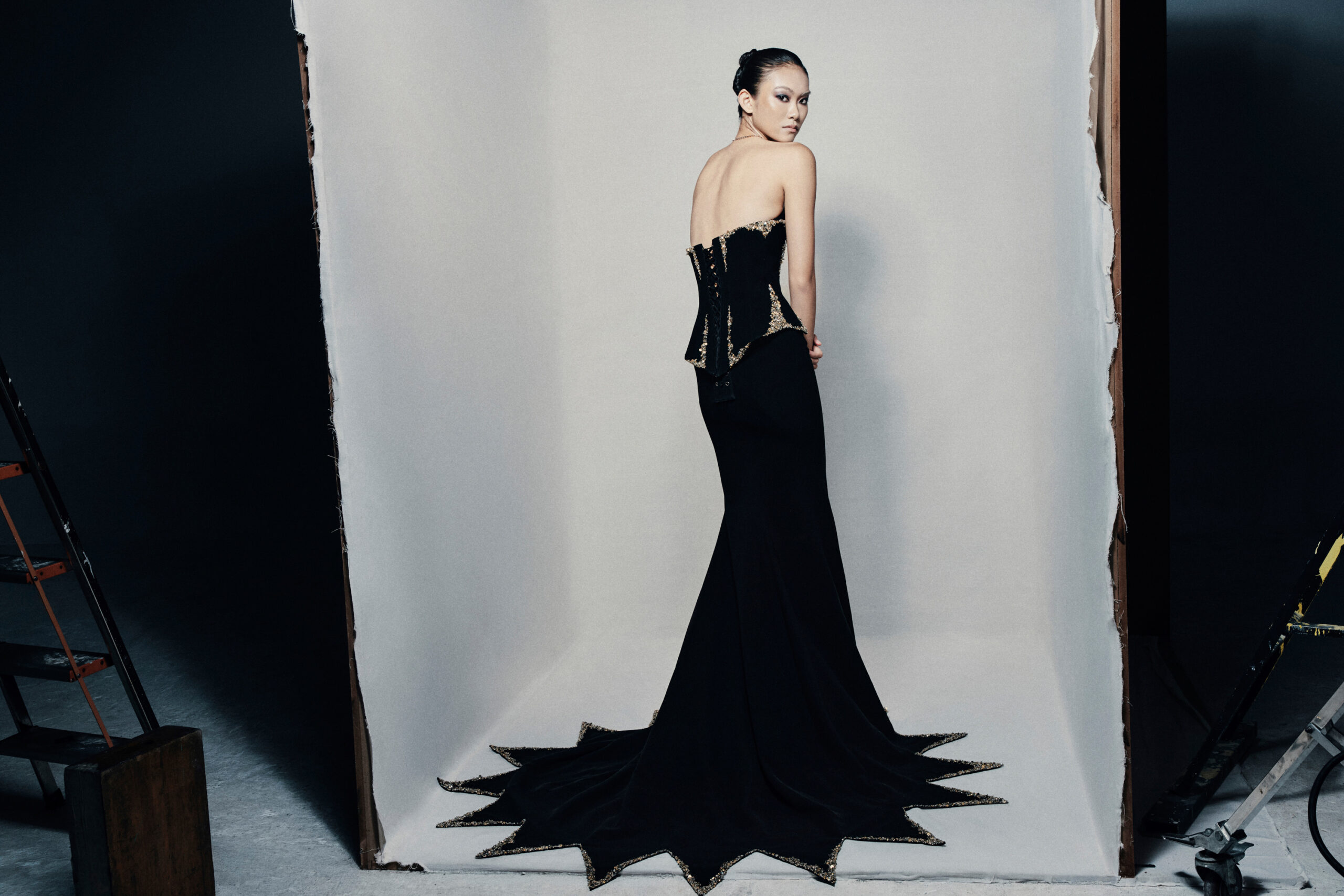 Black strapless fit and flare gown in crepe