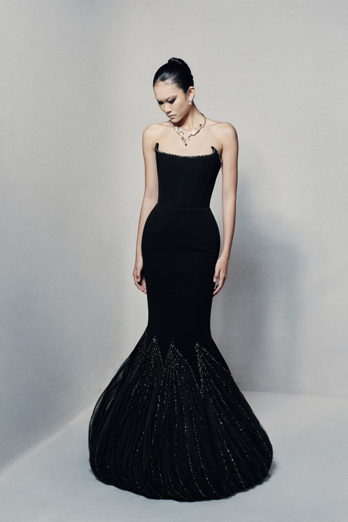 Black strapless mermaid gown in silk crepe