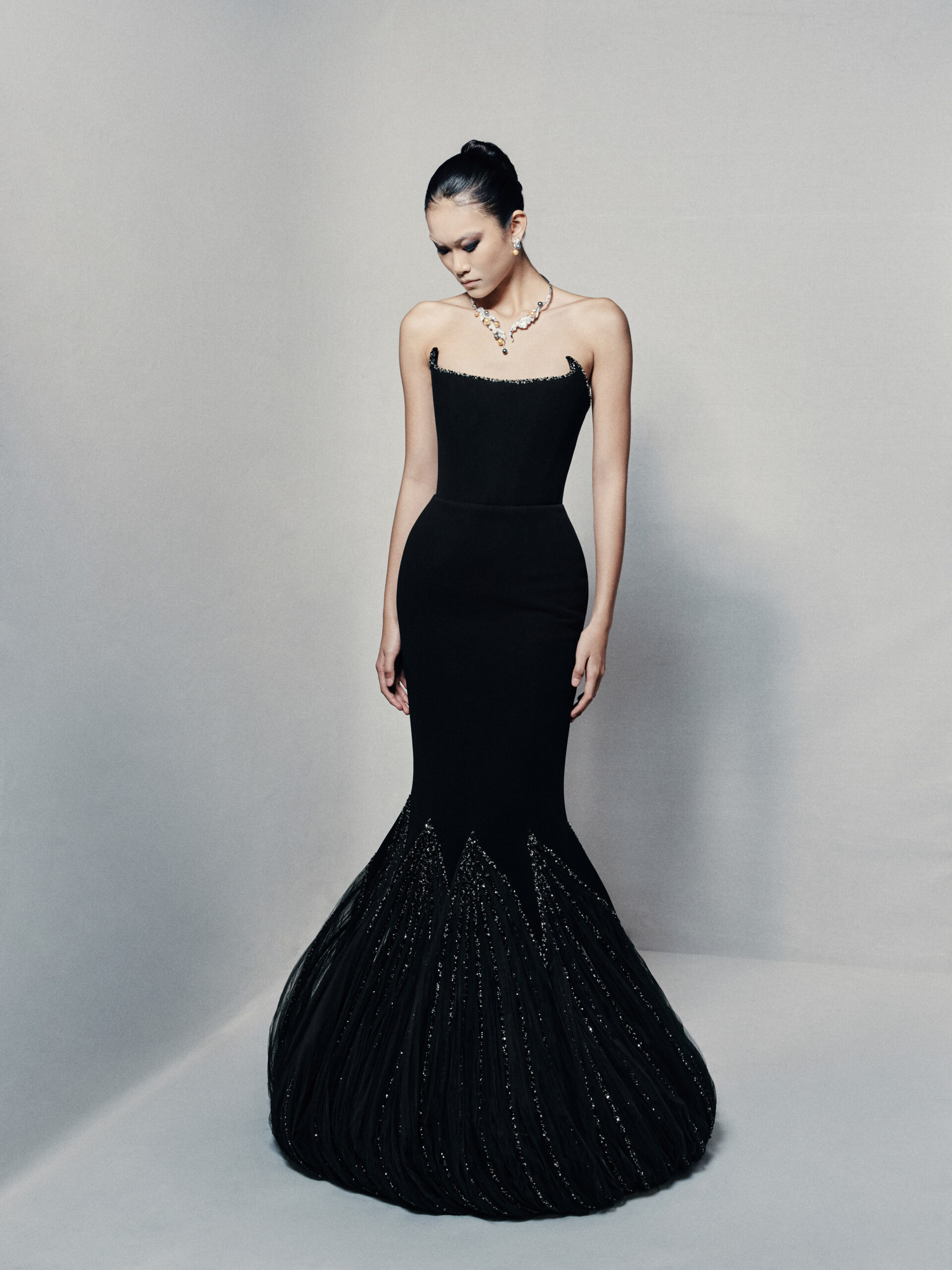 Black strapless mermaid gown in silk crepe