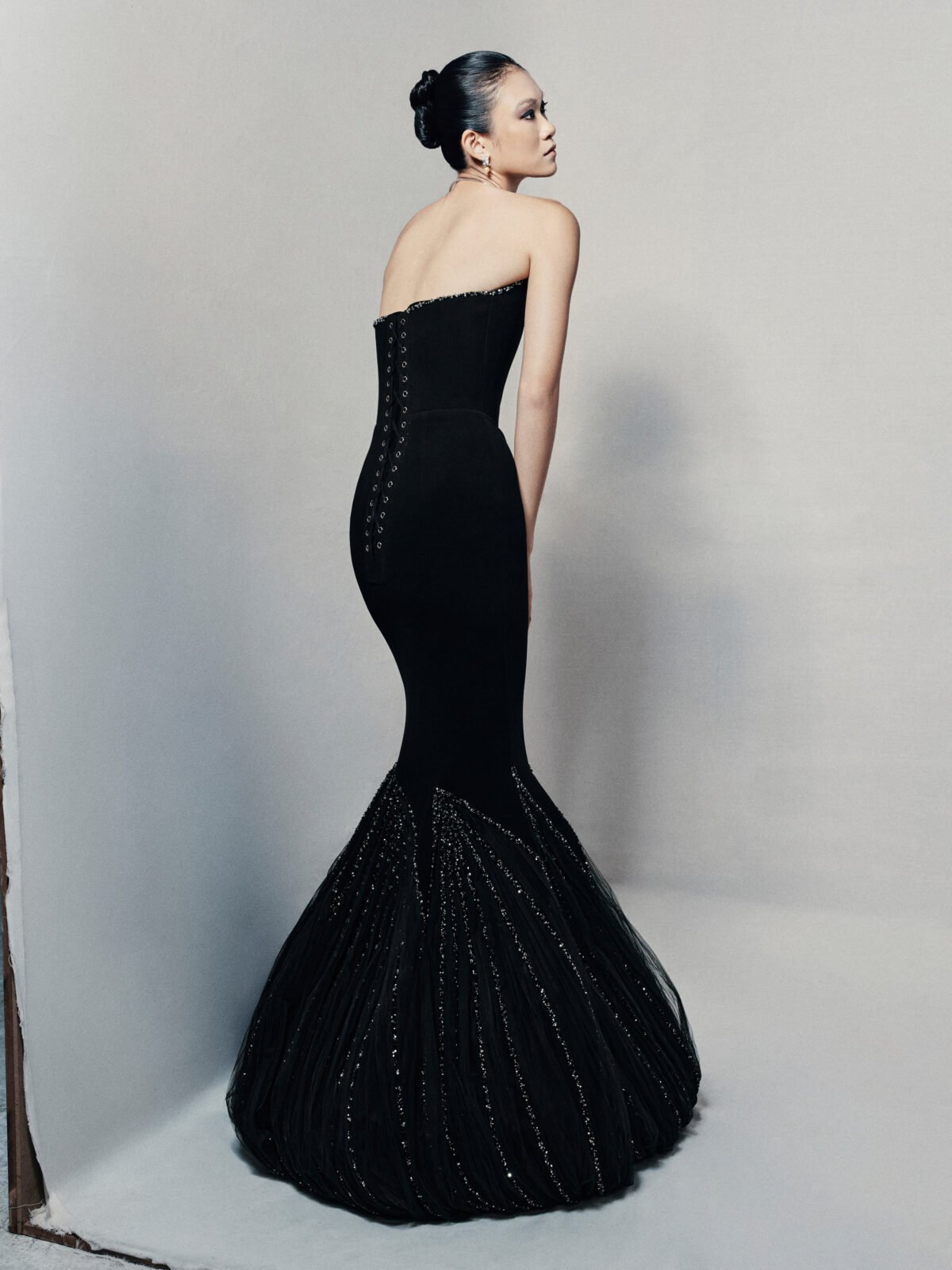 Black strapless mermaid gown in silk crepe