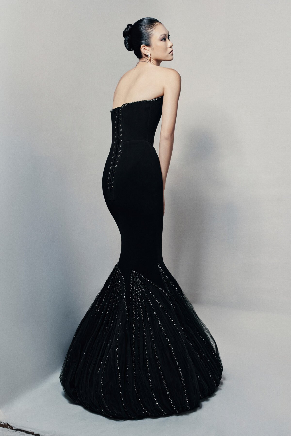 Black strapless mermaid gown in silk crepe