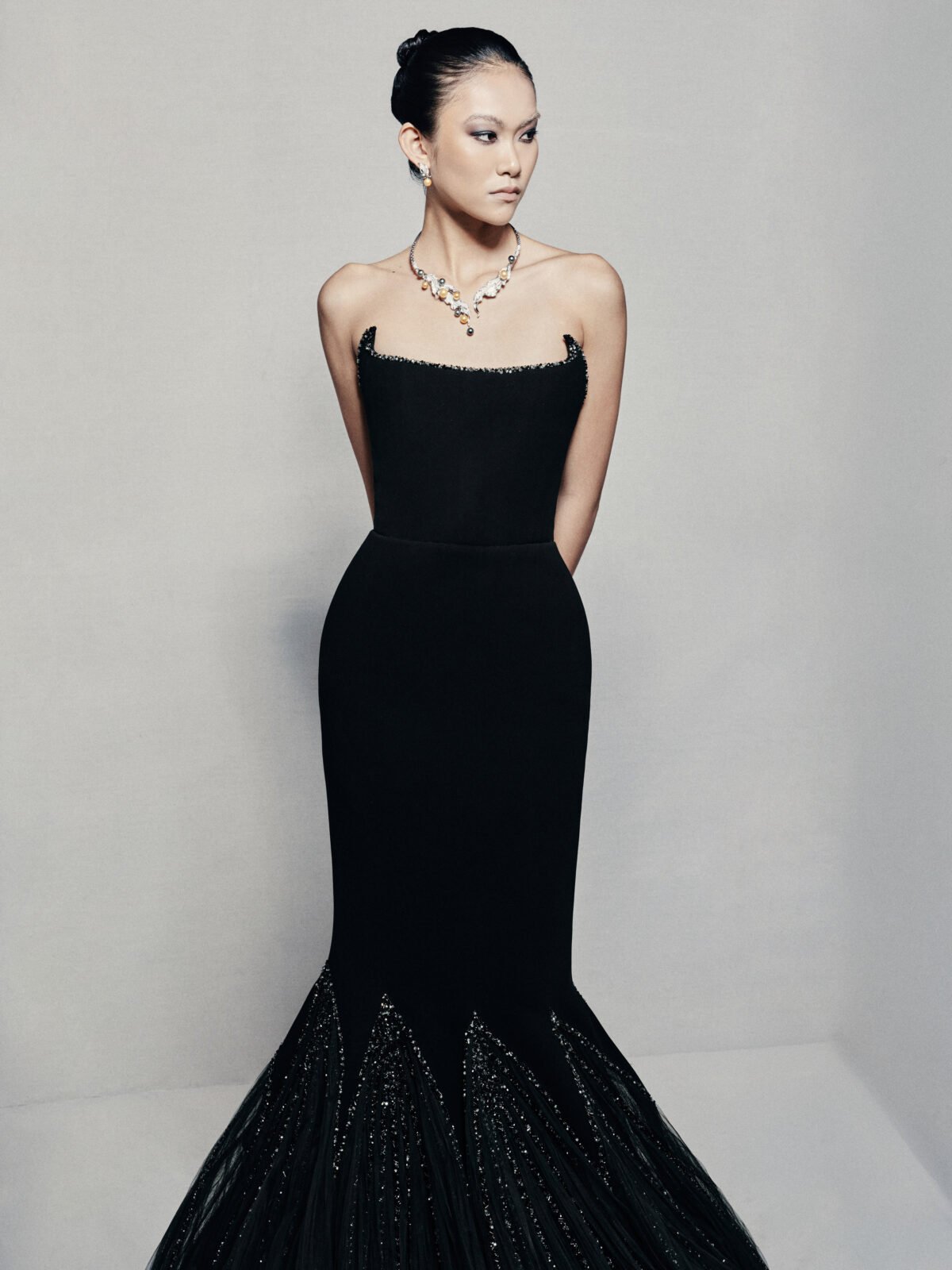 Black strapless mermaid gown in silk crepe