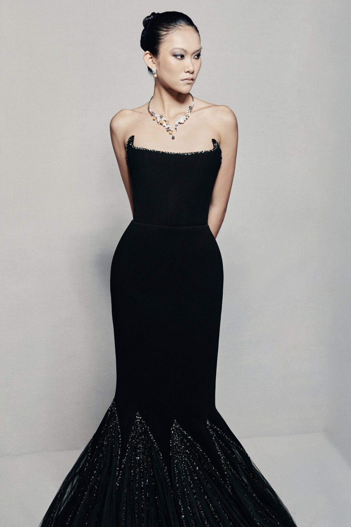 Black strapless mermaid gown in silk crepe