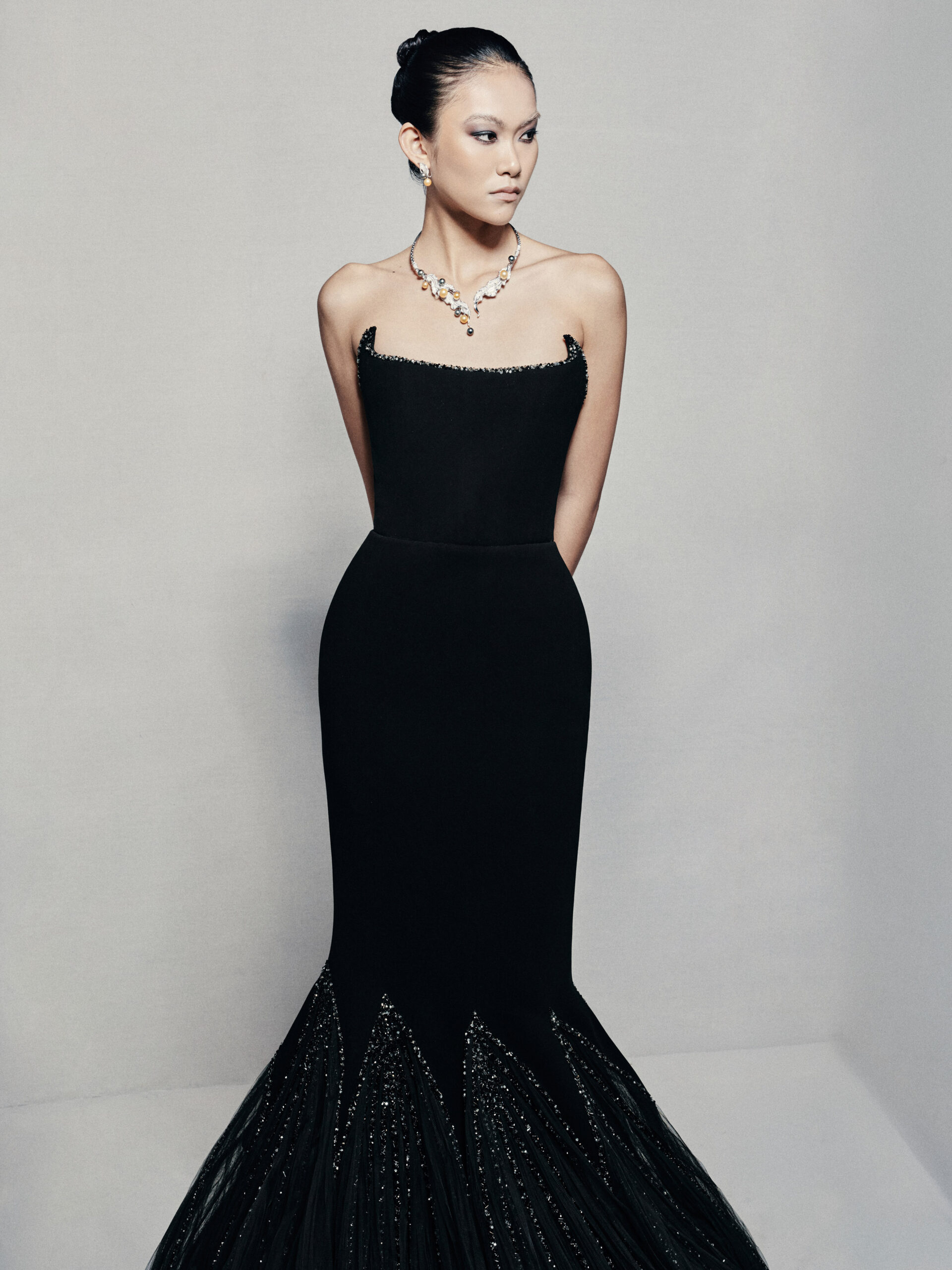Black strapless mermaid gown in silk crepe