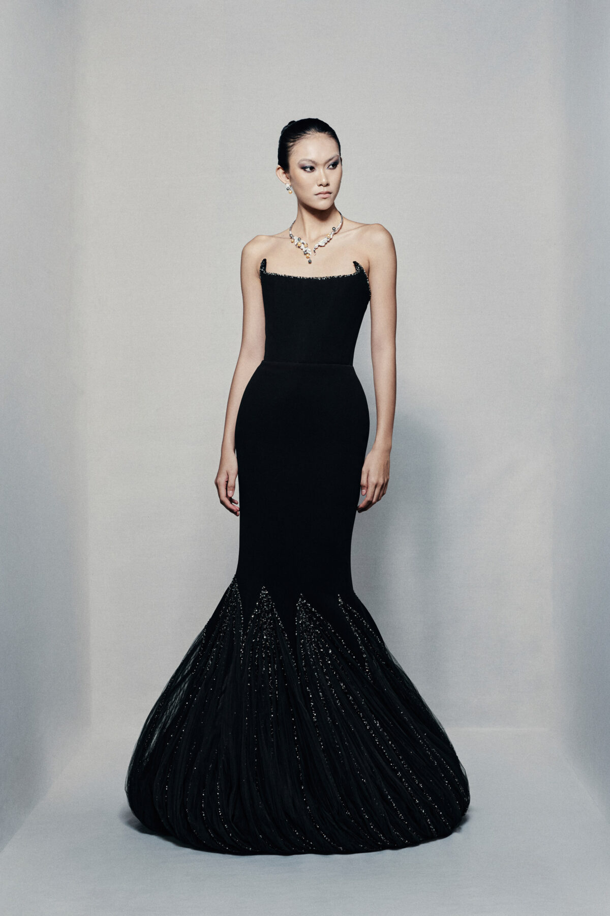 Black strapless mermaid gown in silk crepe