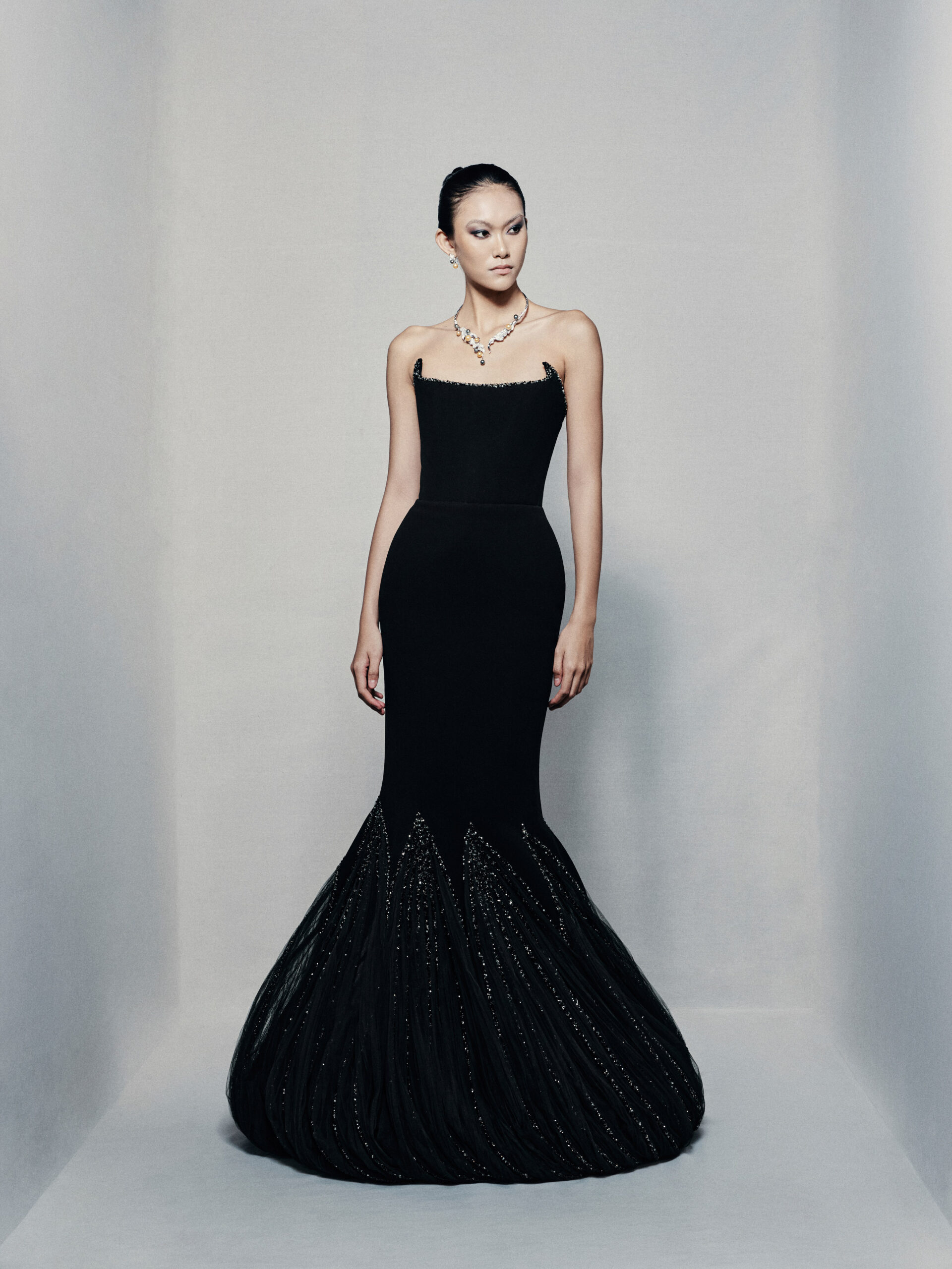 Black strapless mermaid gown in silk crepe