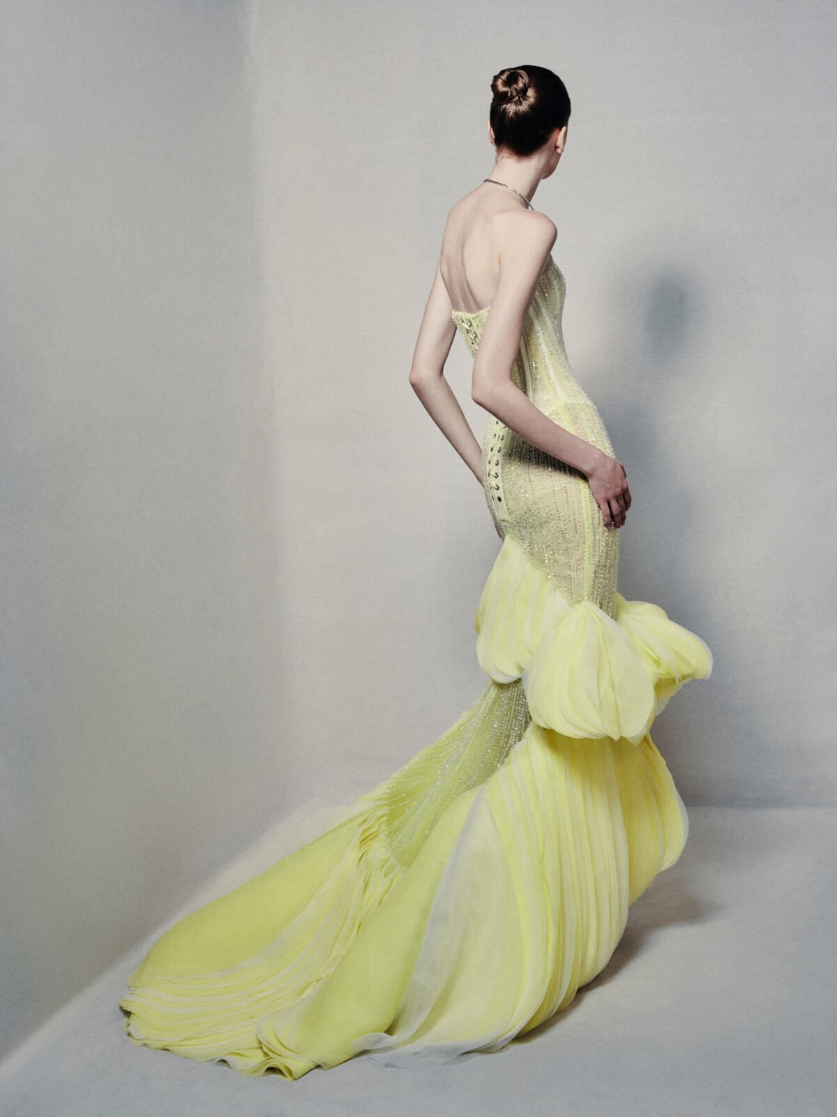 Semi-sheer strapless mermaid gown in lime yellow