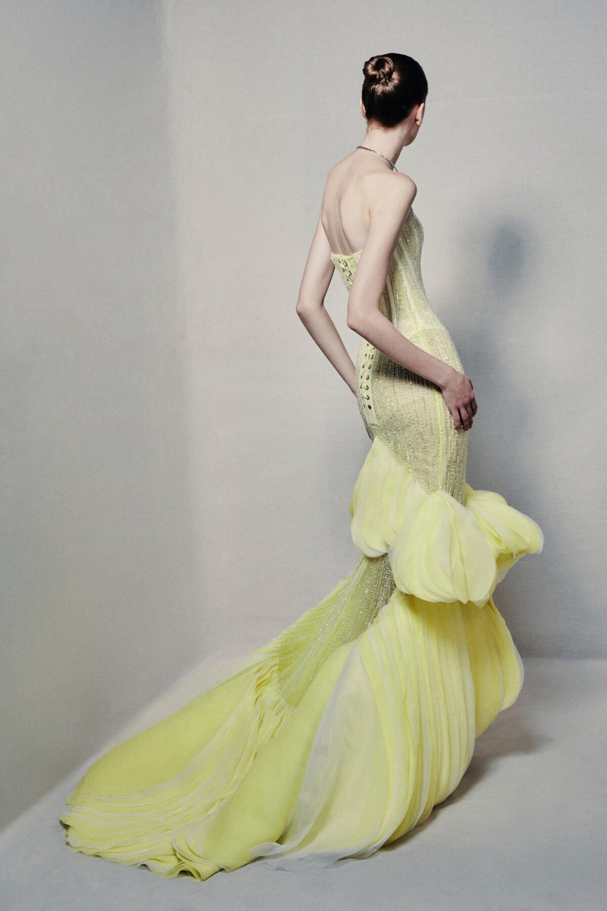 Semi-sheer strapless mermaid gown in lime yellow