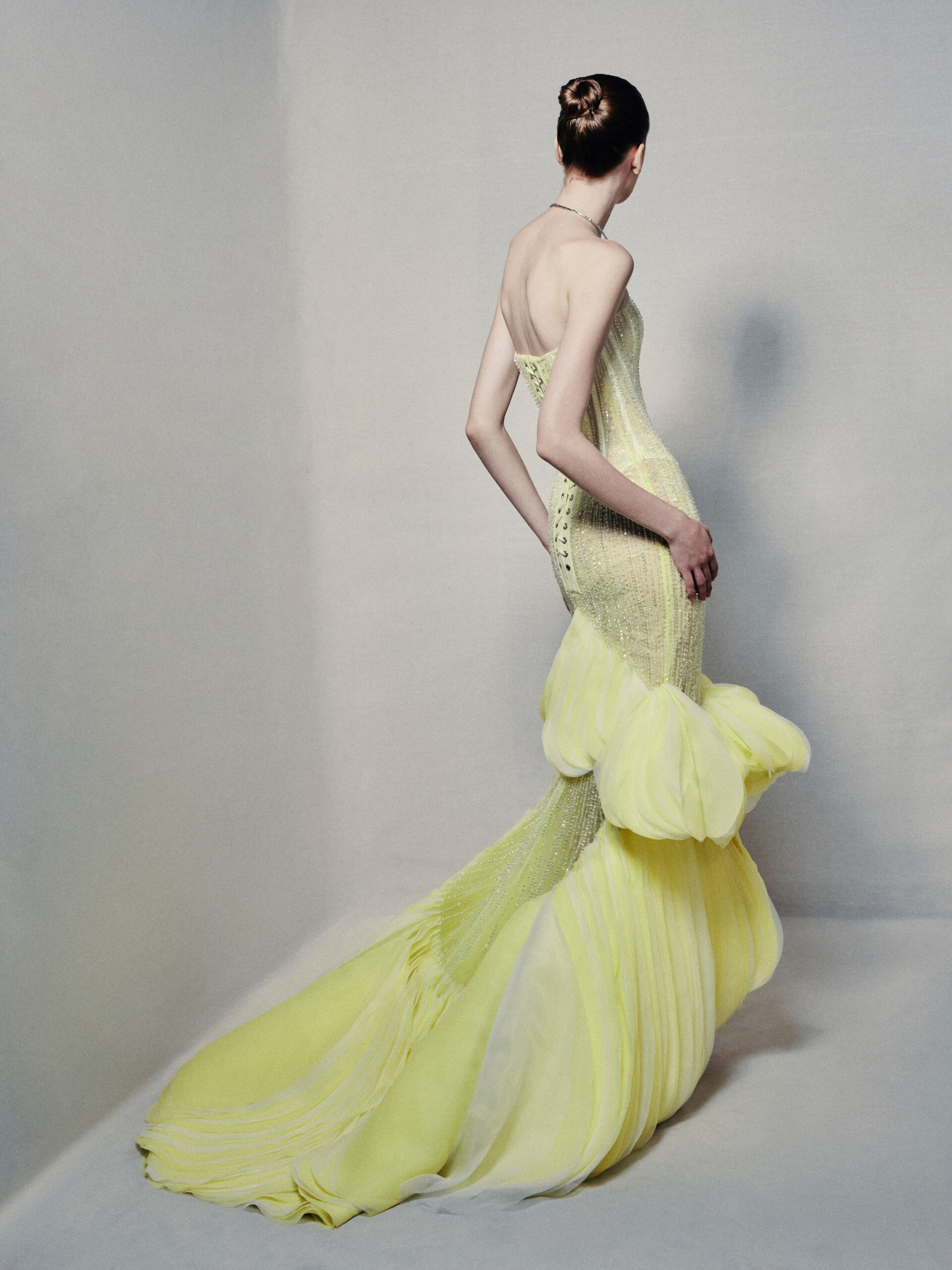 Semi-sheer strapless mermaid gown in lime yellow