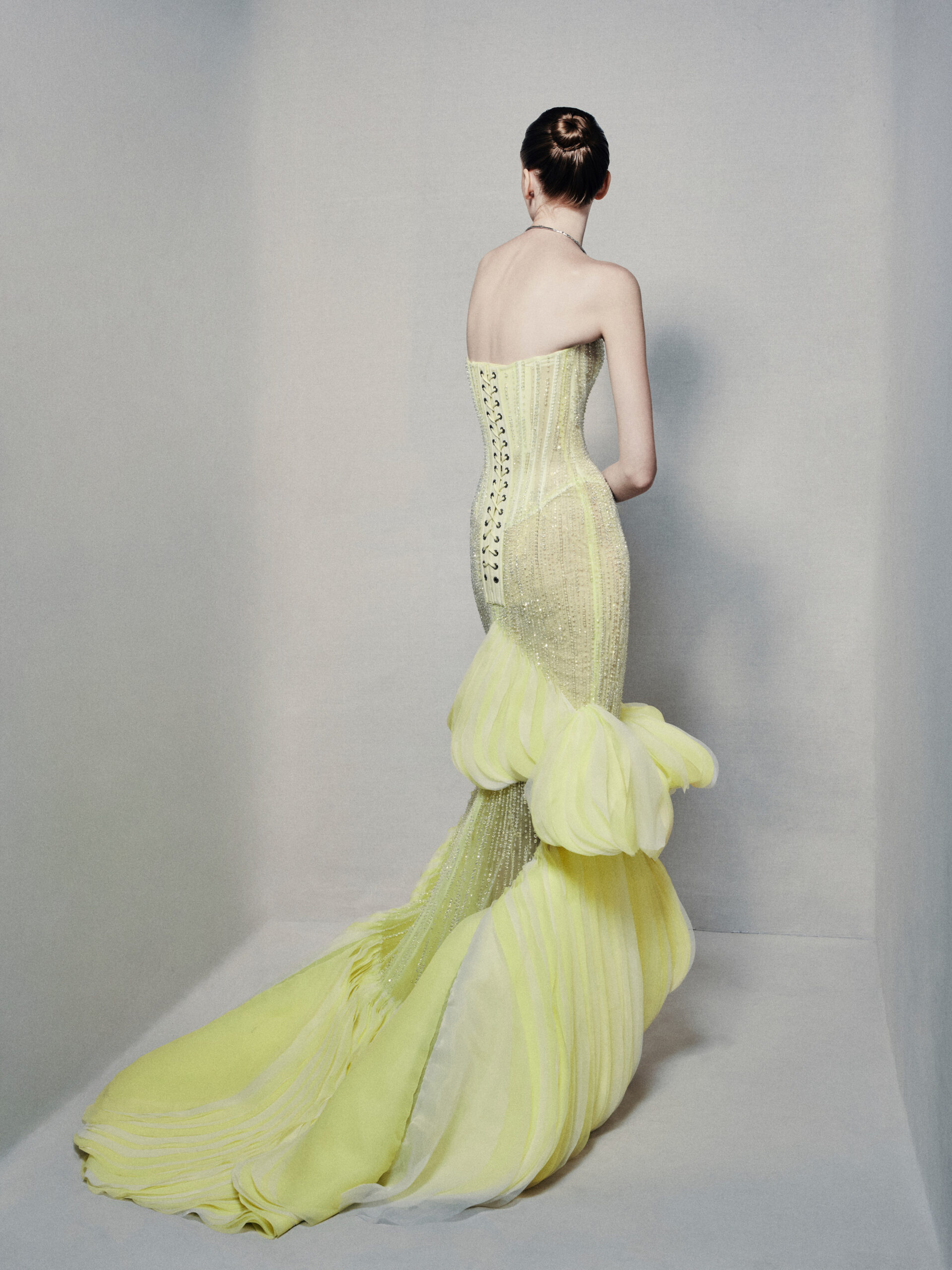 Semi-sheer strapless mermaid gown in lime yellow