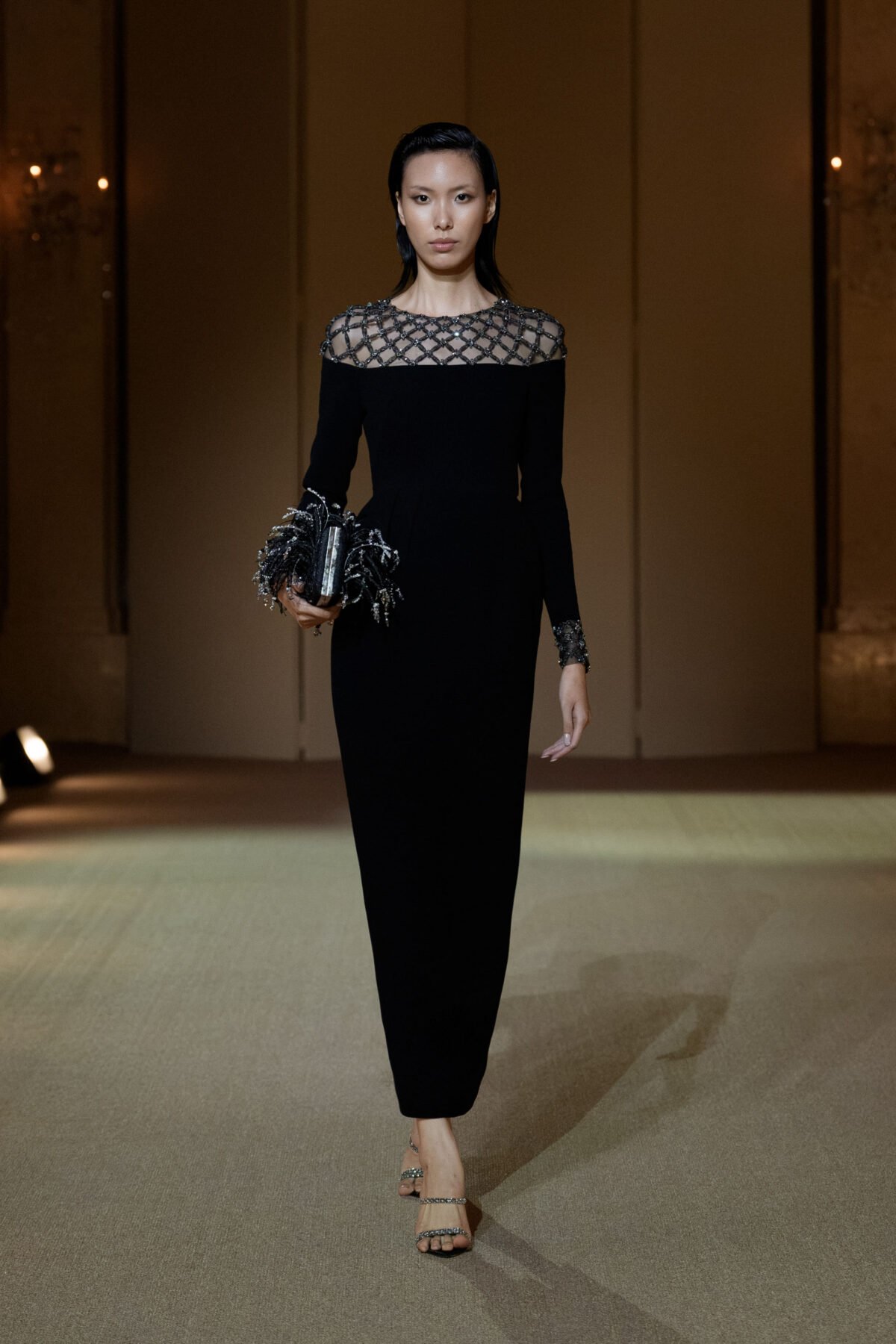Black tea-length dress with beaded yoke by PHAN HUY