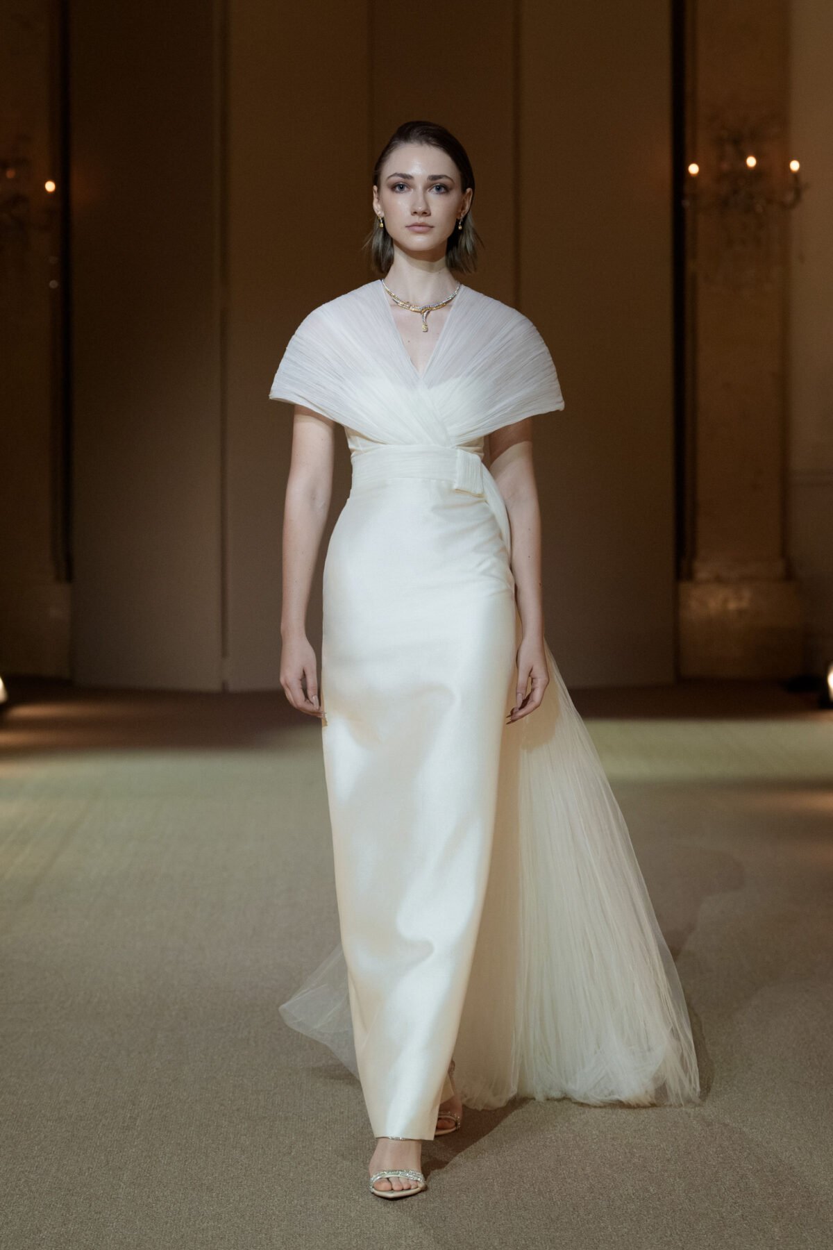 Ivory white pleated tulle column gown by PHAN HUY