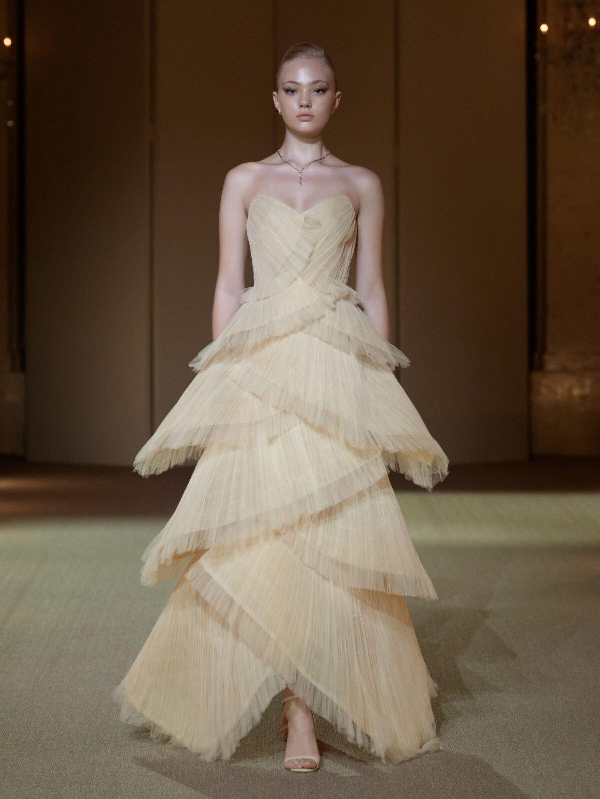 Beige sweetheart A-line gown with hand-pleated chiffon ruffles