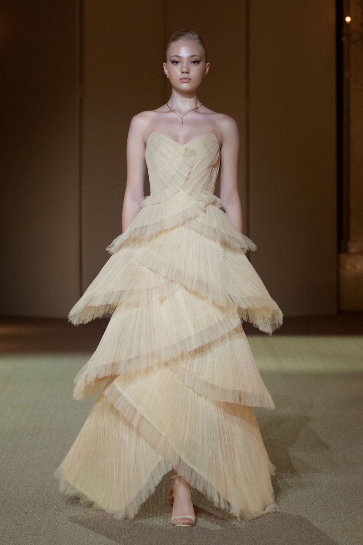 Beige sweetheart A-line gown with hand-pleated chiffon ruffles