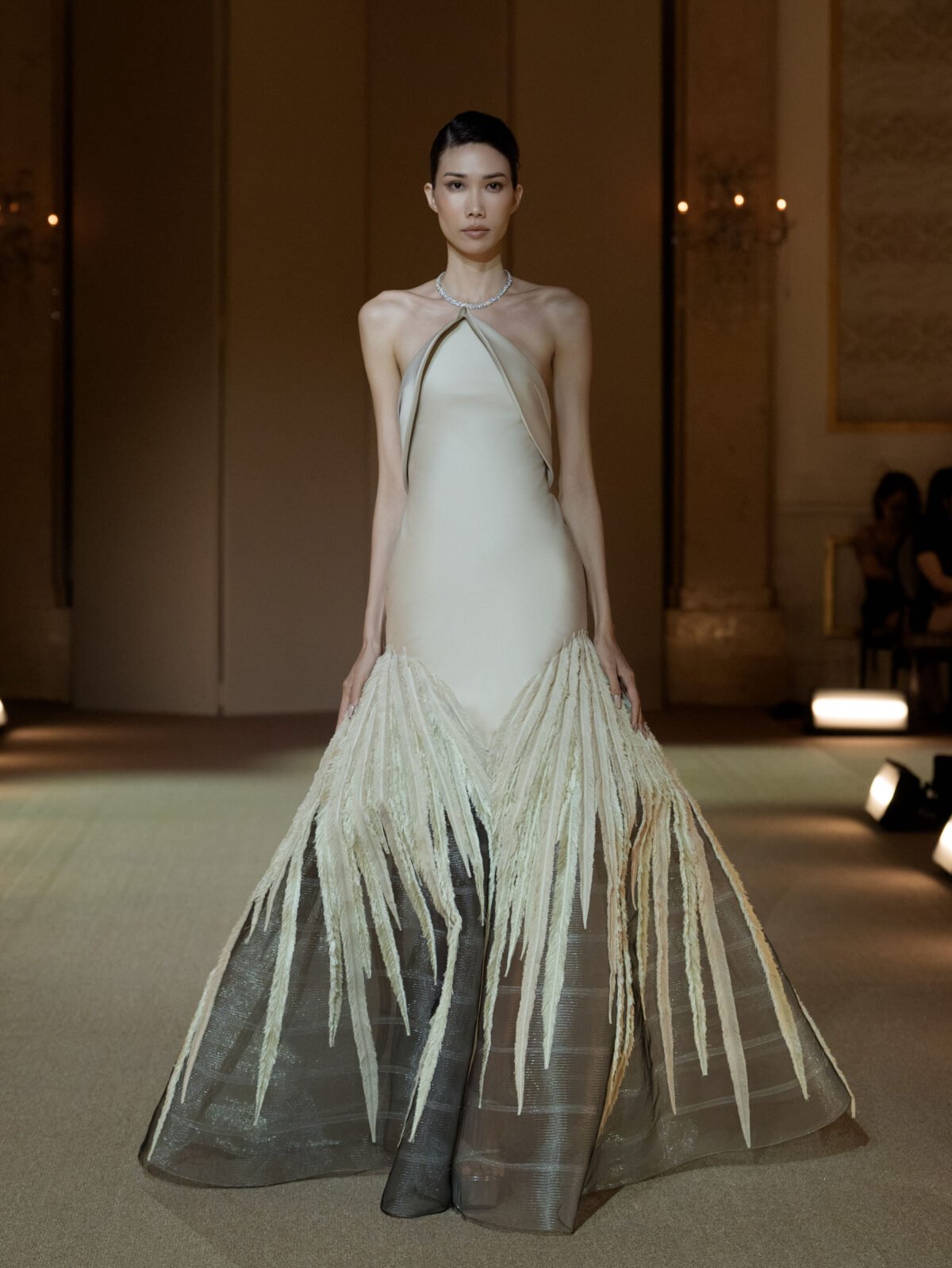 Ivory strapless fit-and-flare evening gown with a contrasting black underskirt