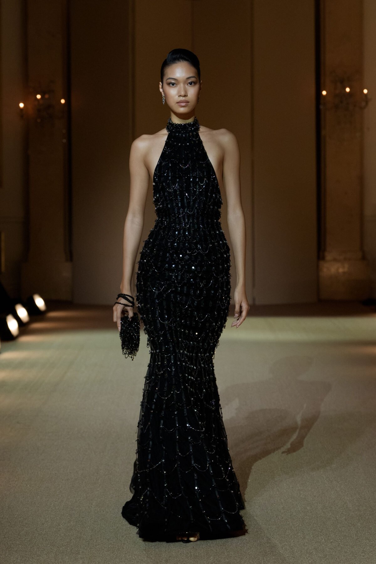 Black halterneck mermaid gown with crystal chain beadwork