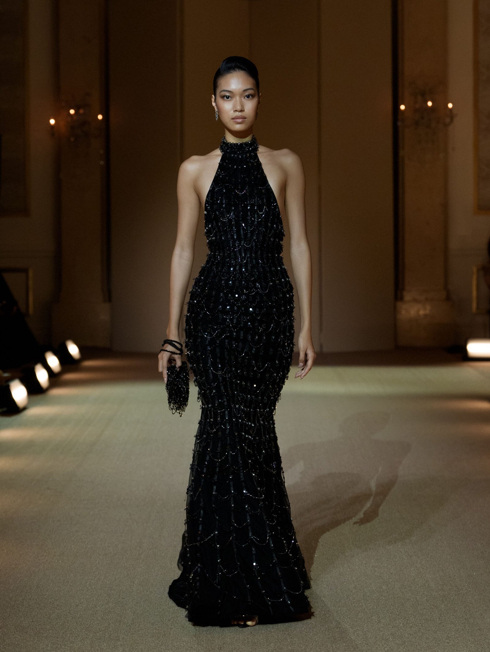 Black halterneck mermaid gown with crystal chain beadwork