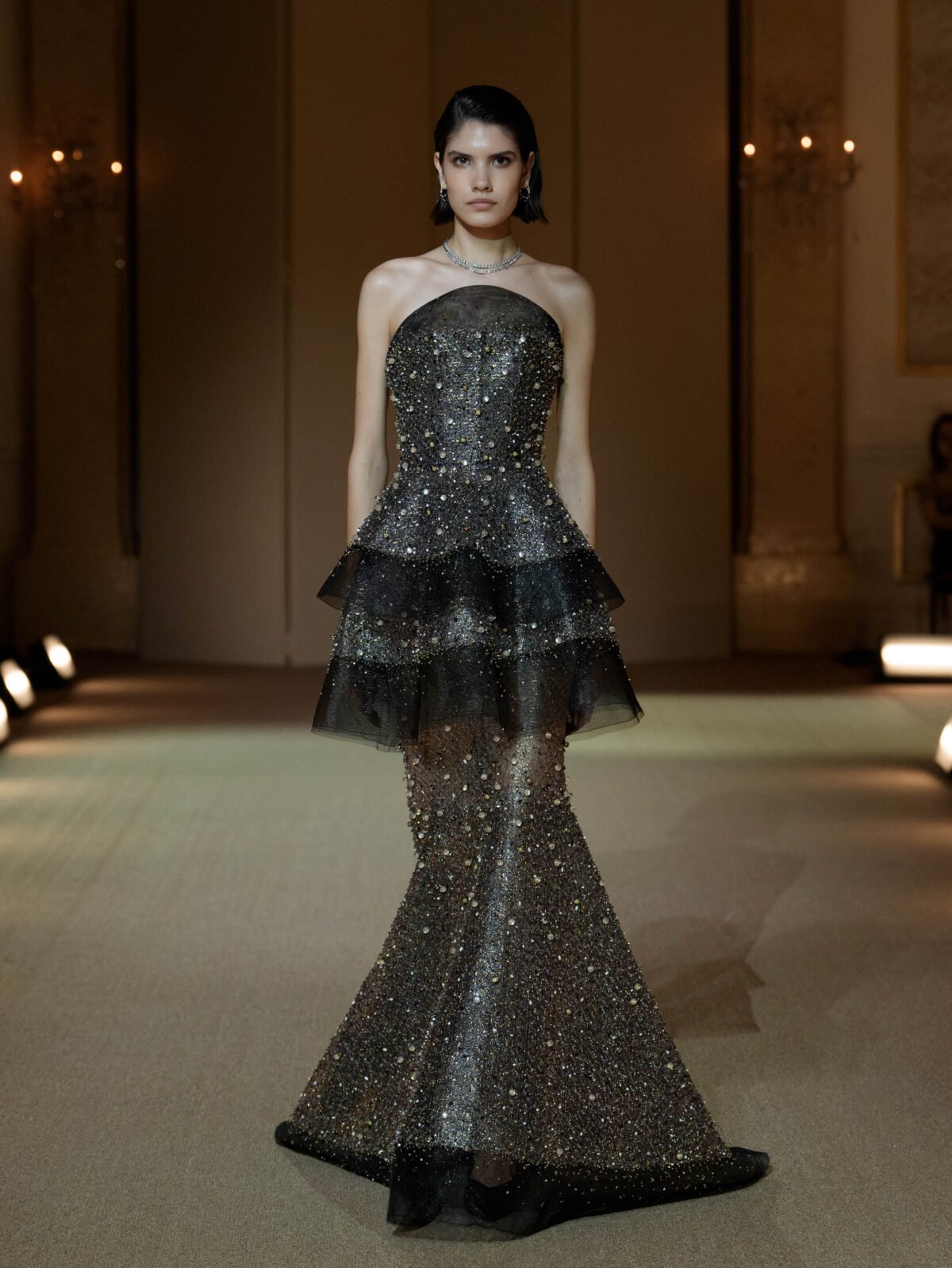 Black strapless fit-and-flare gown with dense beaded embellishment